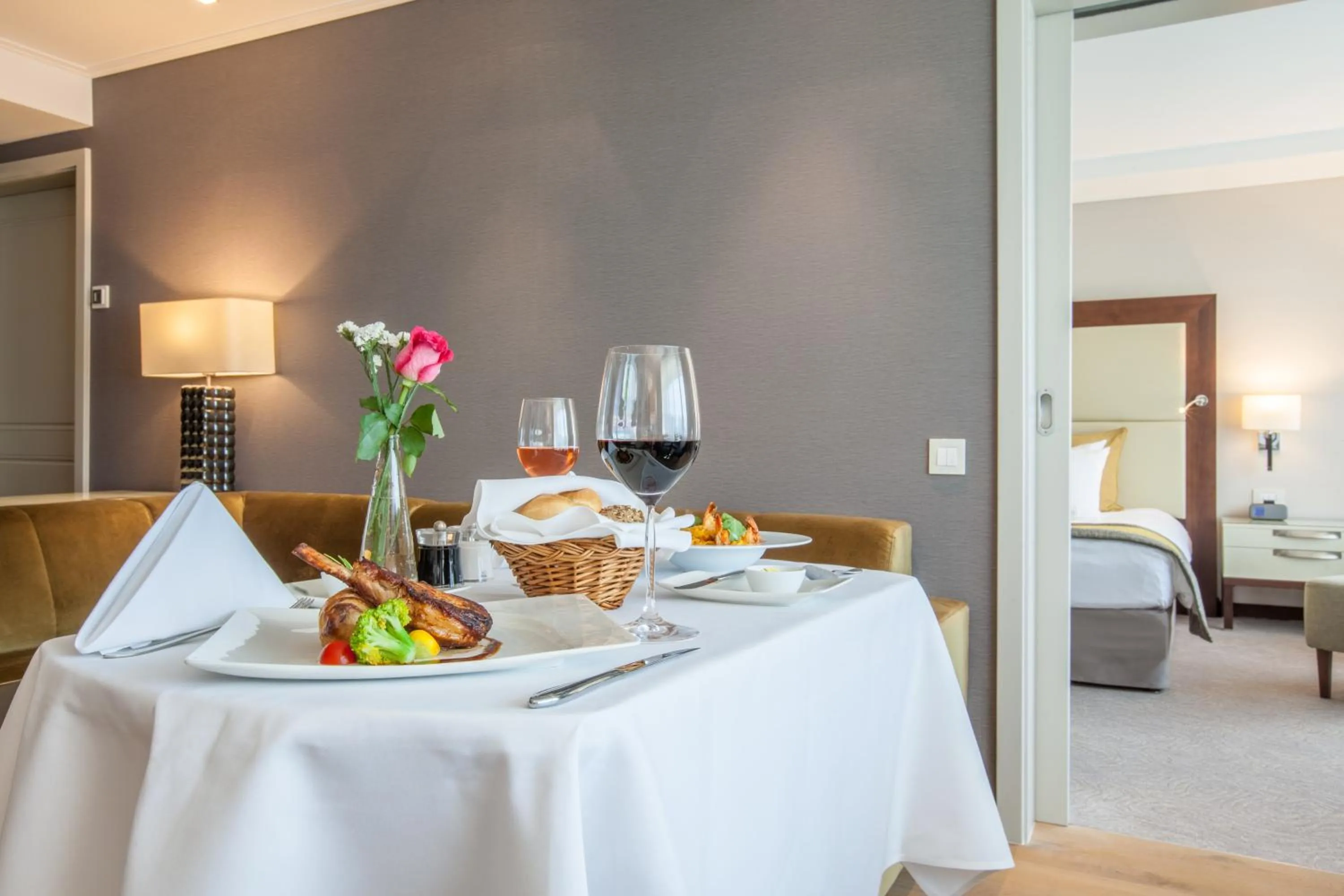 Living room, Bed in Crowne Plaza Bucharest by IHG