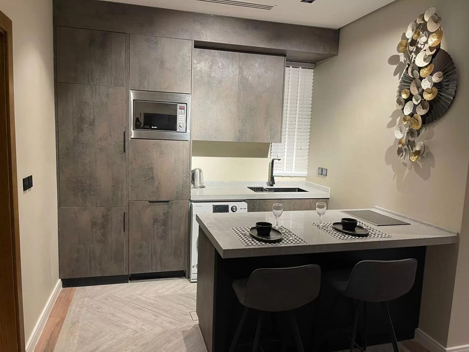 Kitchen or kitchenette in Voyage Residence فوياج ريسيدنس للشقق المخدومة