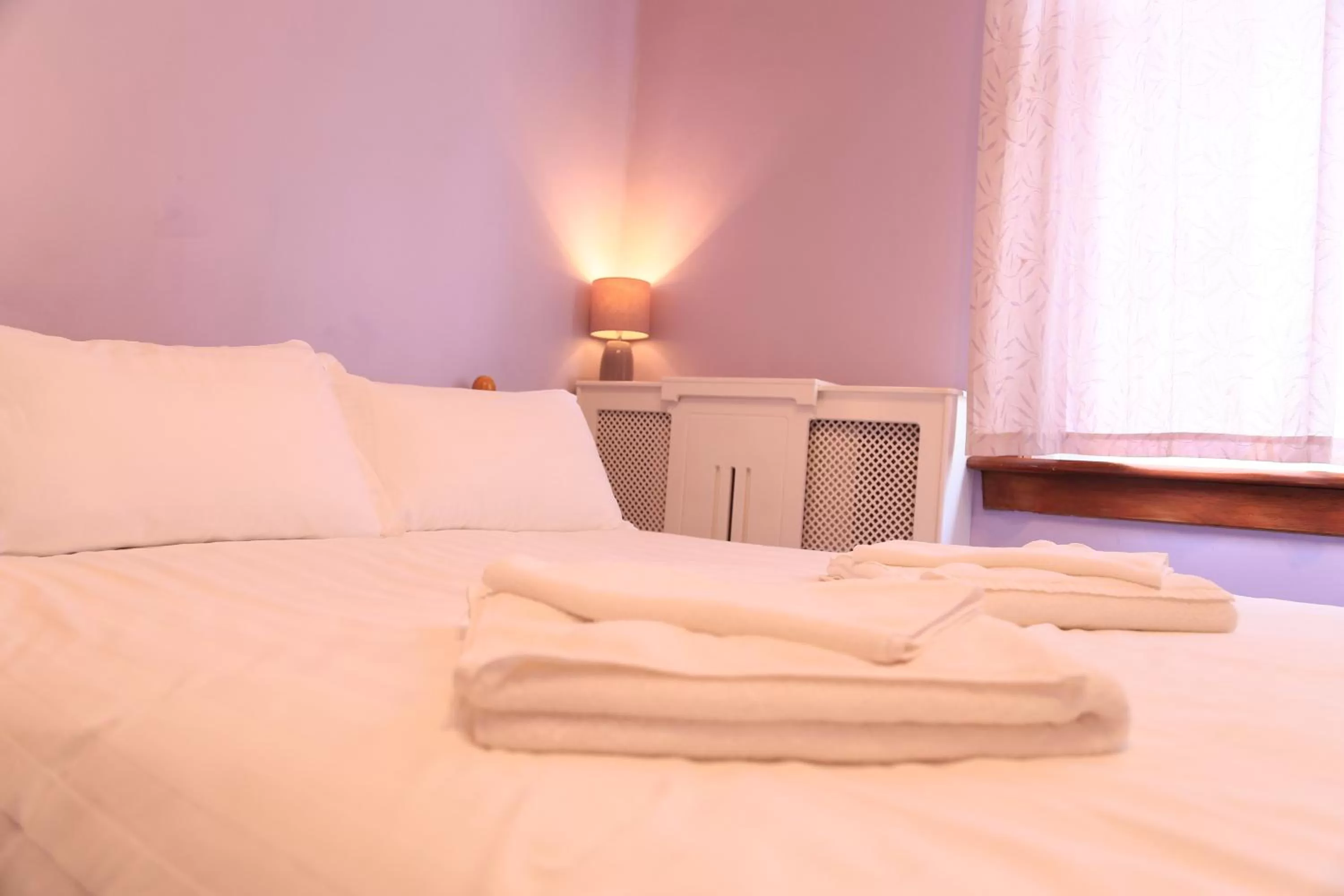 Decorative detail, Bed in Twin Lions Hotel