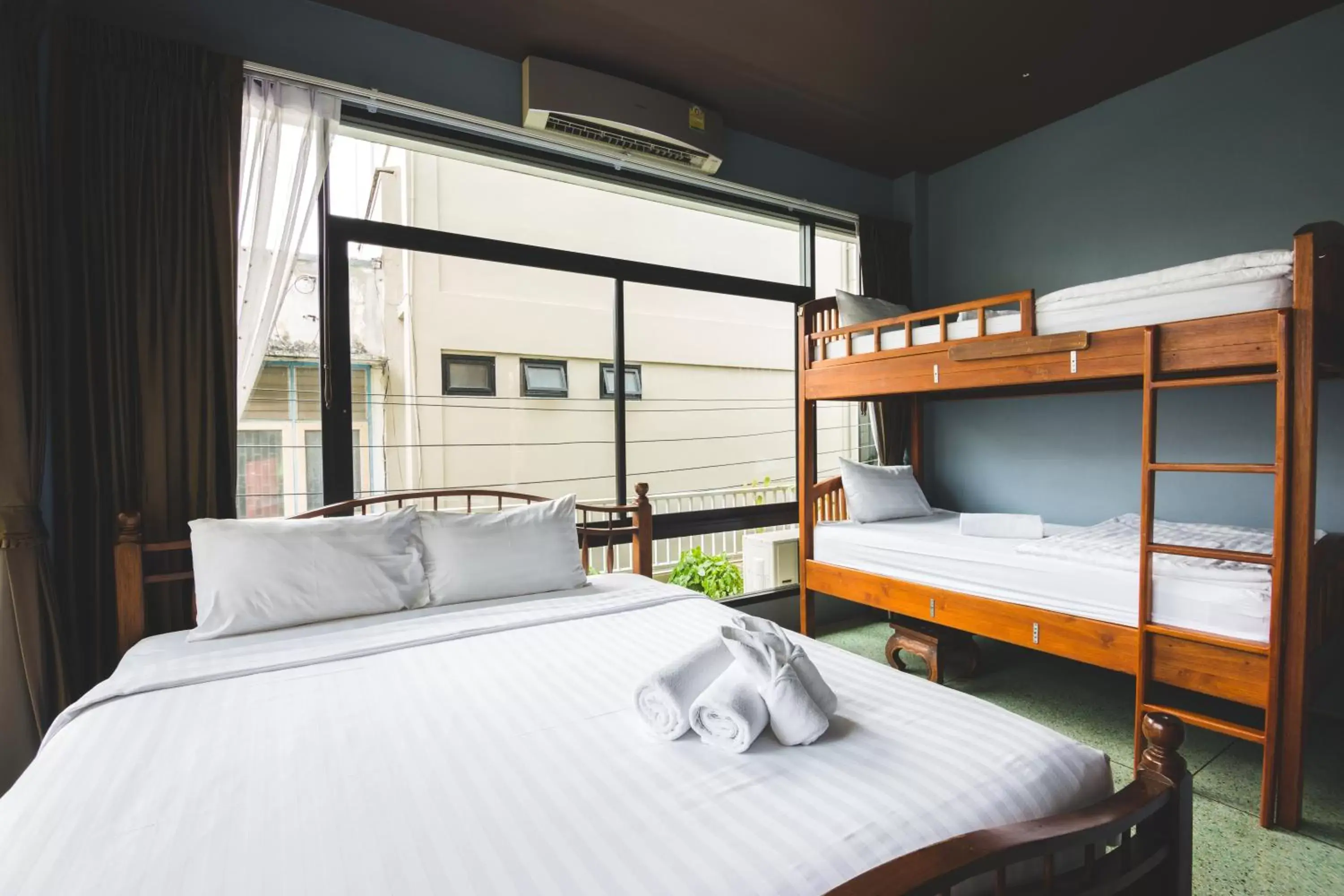 Superior Family Room with Shared Bathroom in Feung Nakorn Balcony Rooms and Cafe Superior Family Room with Shared Bathroom in Feung Nakorn Balcony Rooms and Cafe
