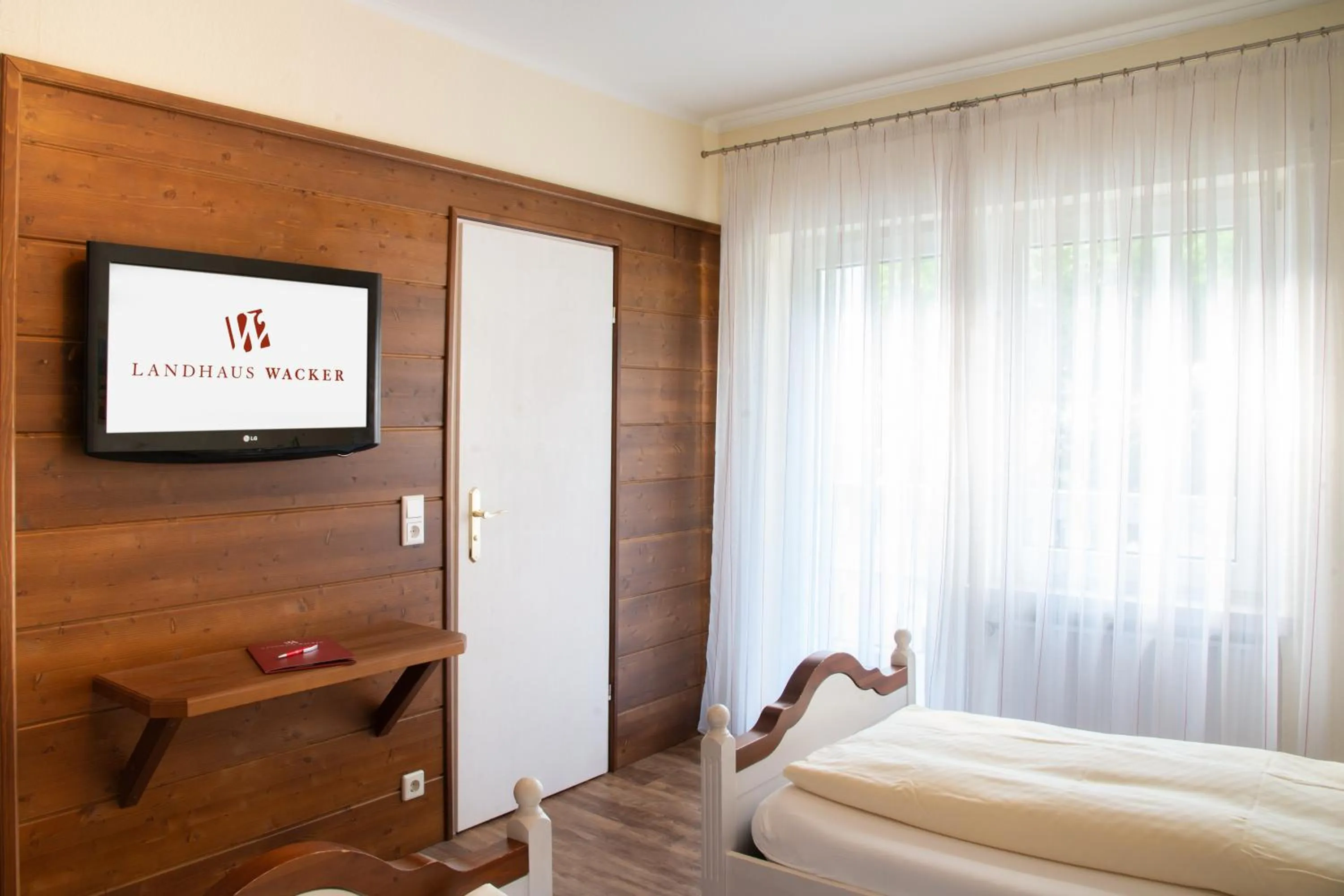 Photo of the whole room, Bed in Landhaus Wacker