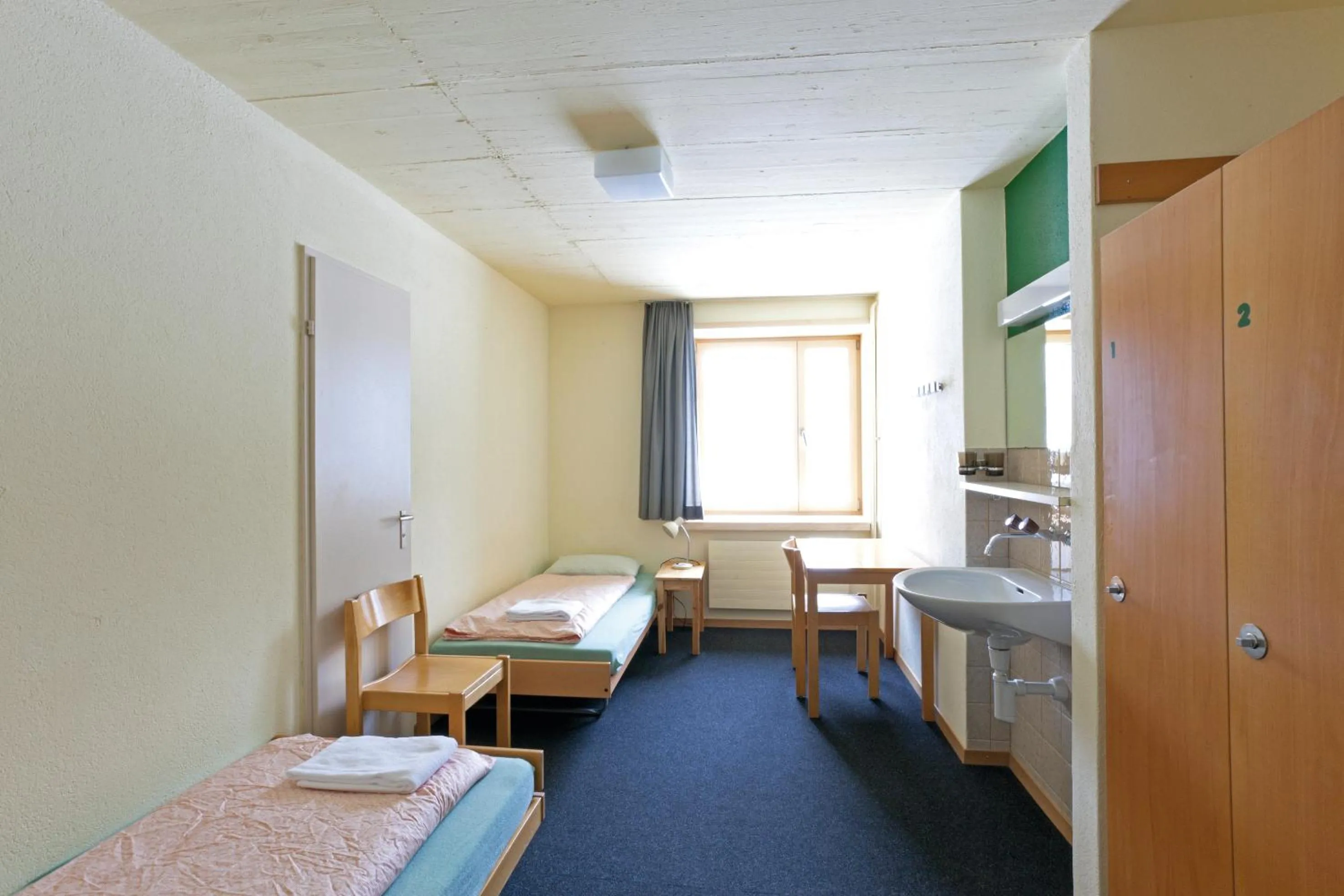 Bathroom, Bed in St. Moritz Youth Hostel