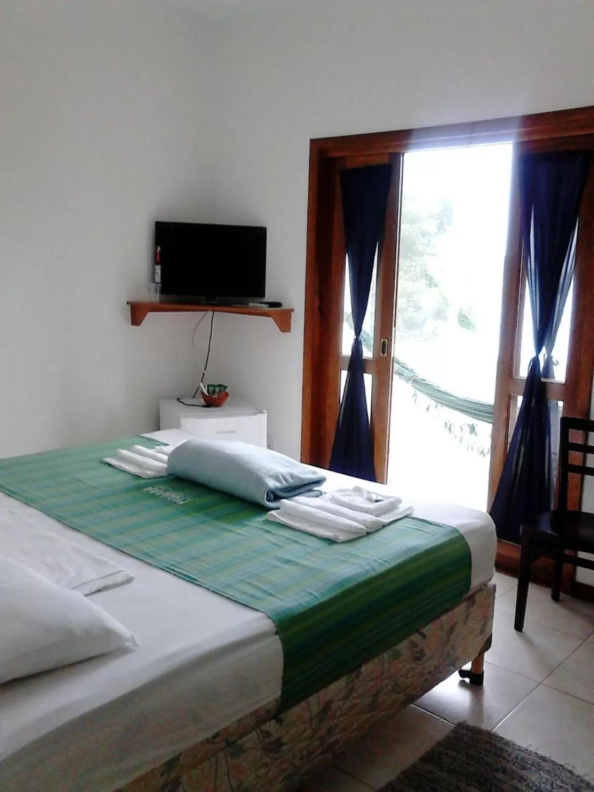 Bed in Pousada Piquara