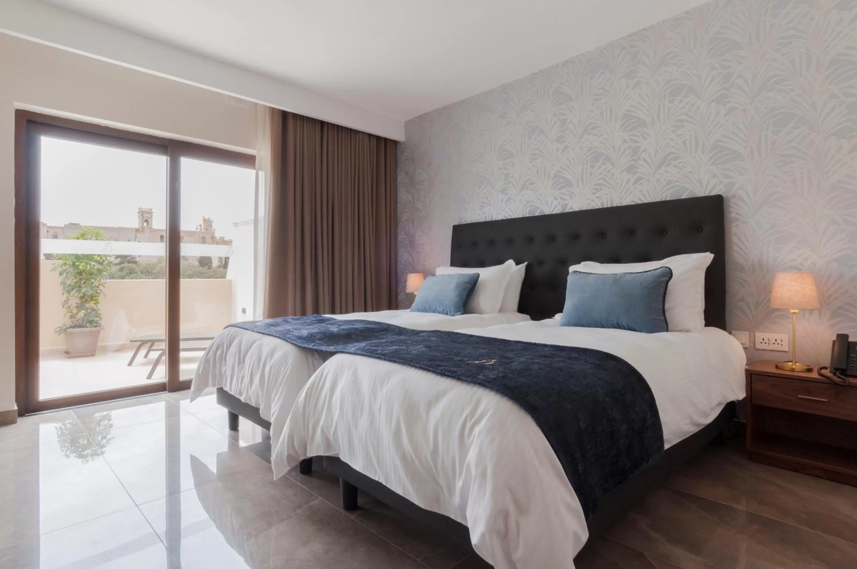 Bed in The Duke Boutique Hotel