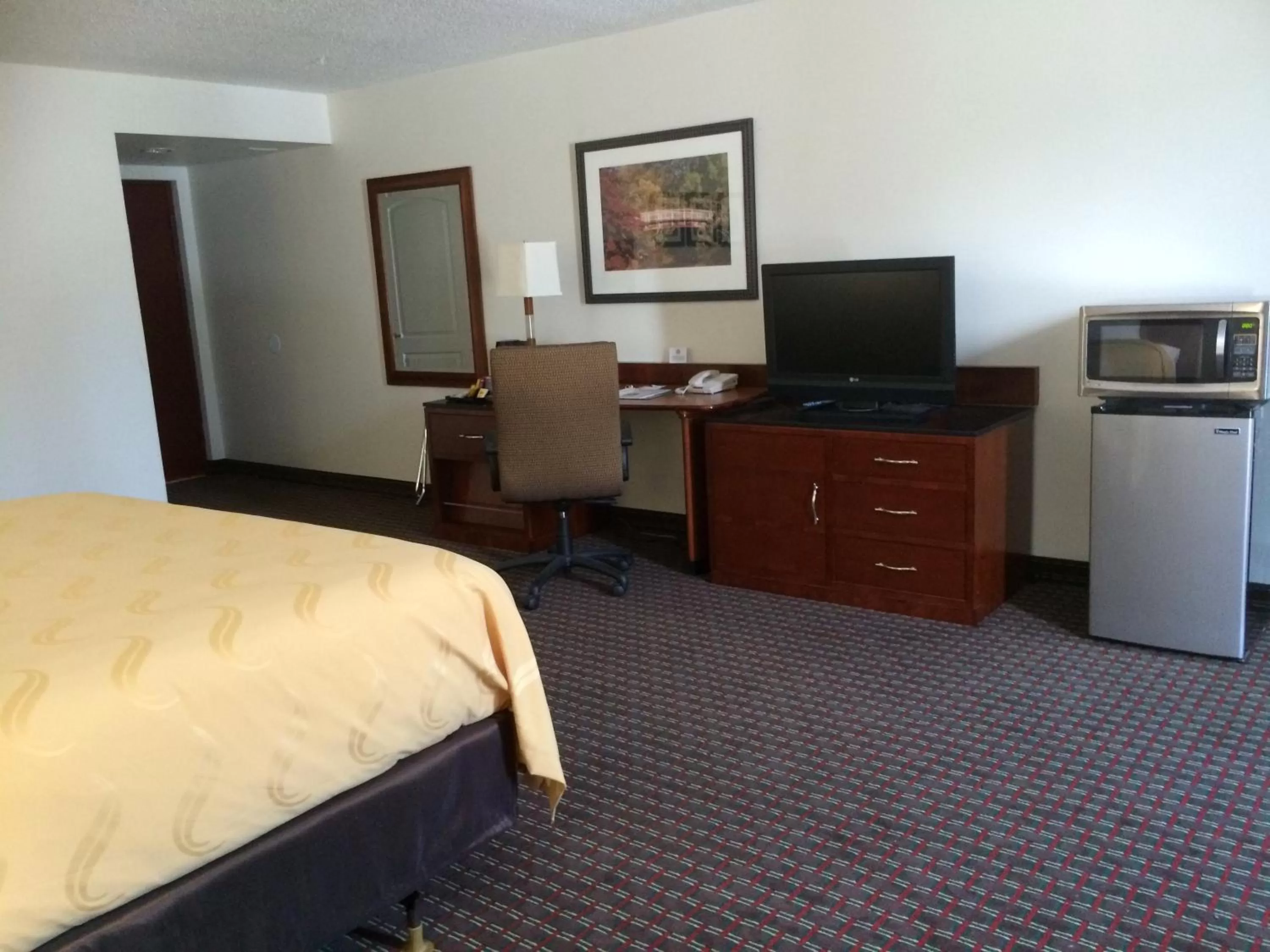 Decorative detail, Bed in Days Inn by Wyndham Hartsfield Jackson Atlanta Airport West