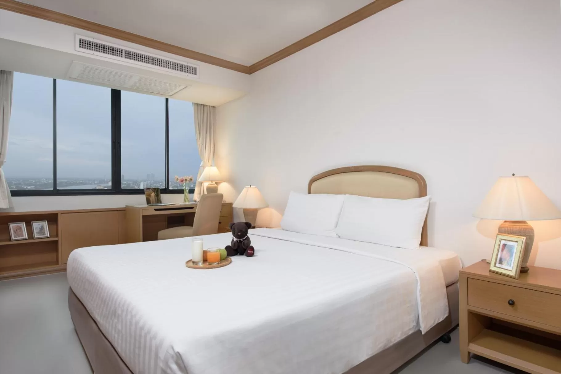Bed in Riverine Place Hotel and Residence