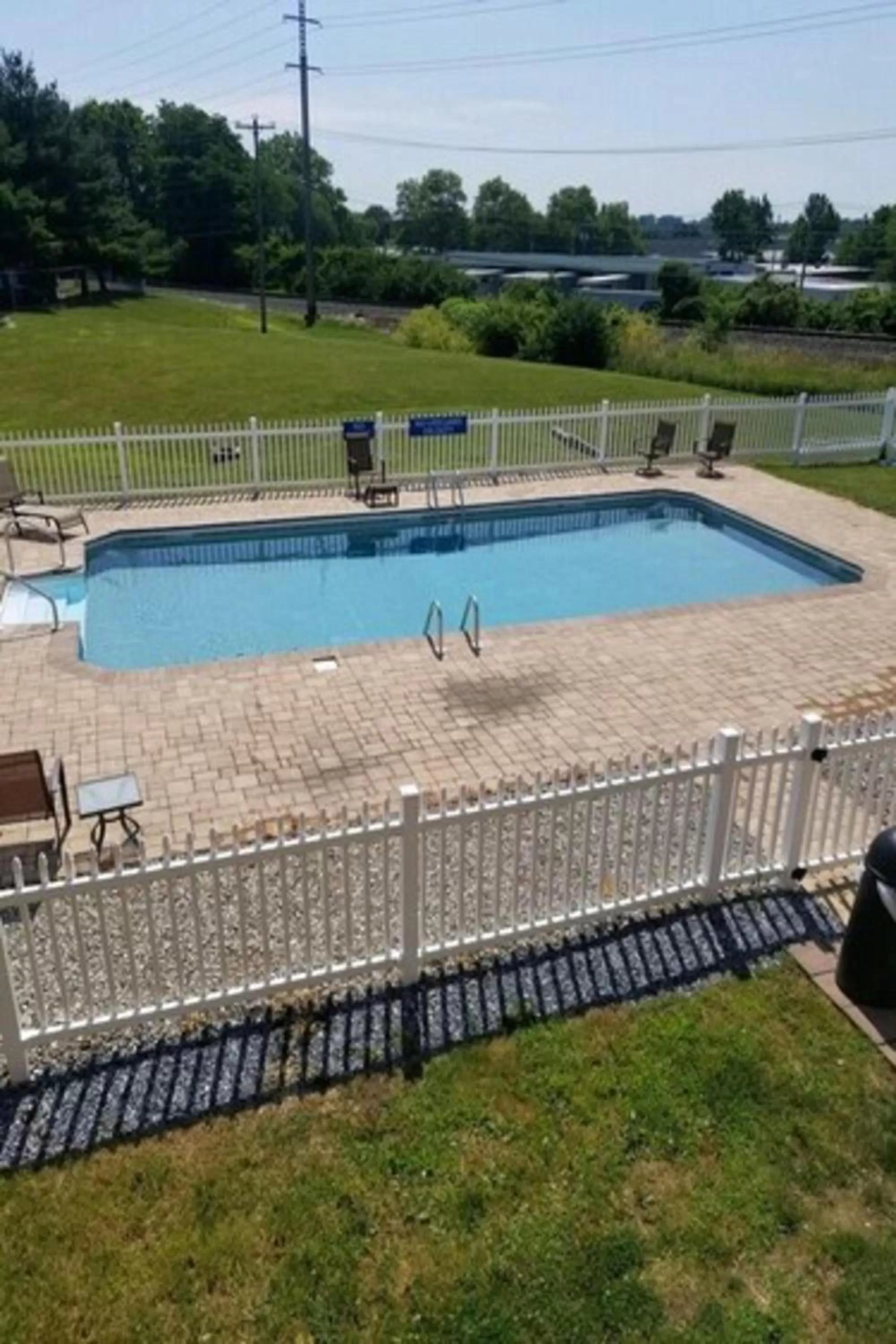 Swimming pool in Days Inn & Suites by Wyndham Lancaster Amish Country