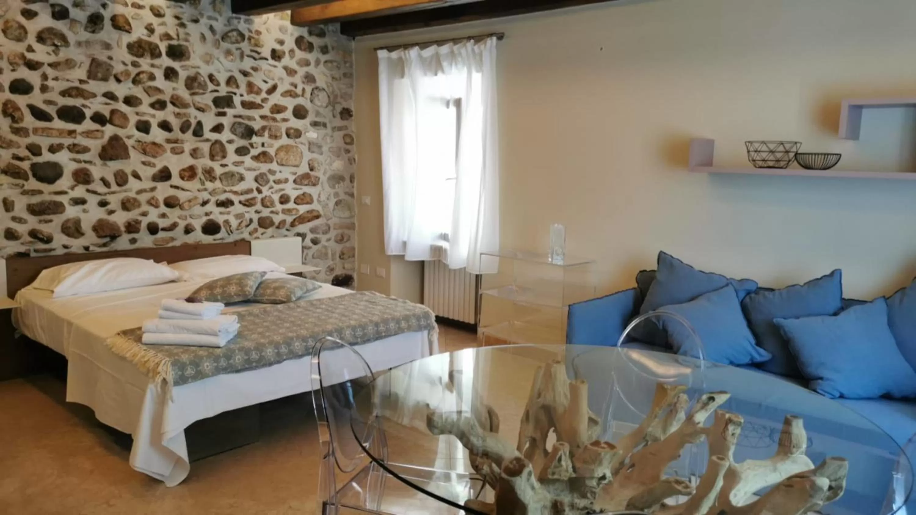 Bed in Corte San Luca Apartments