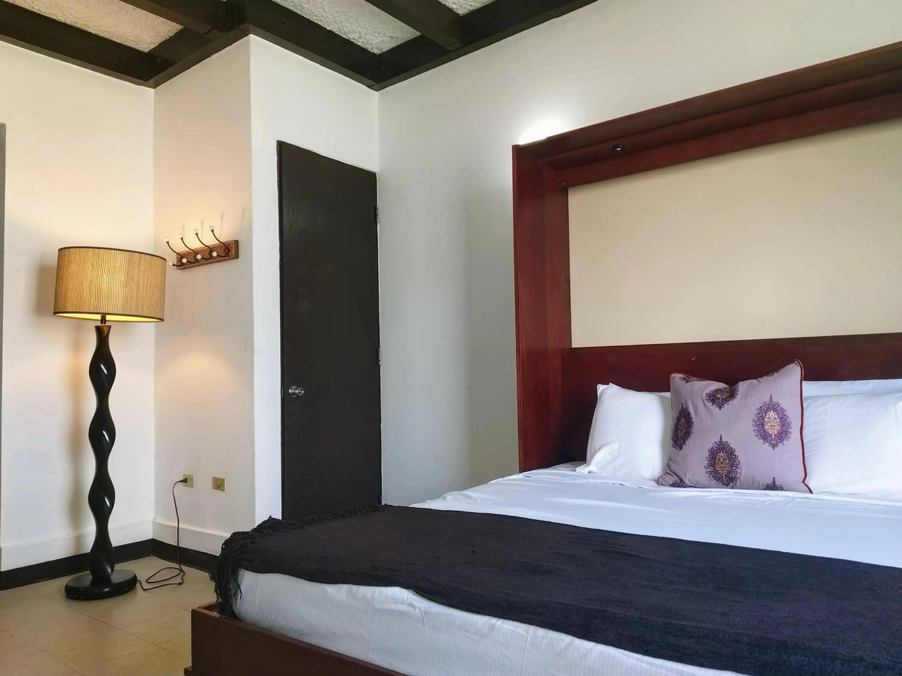 Bed in La Capitana Old San Juan Building