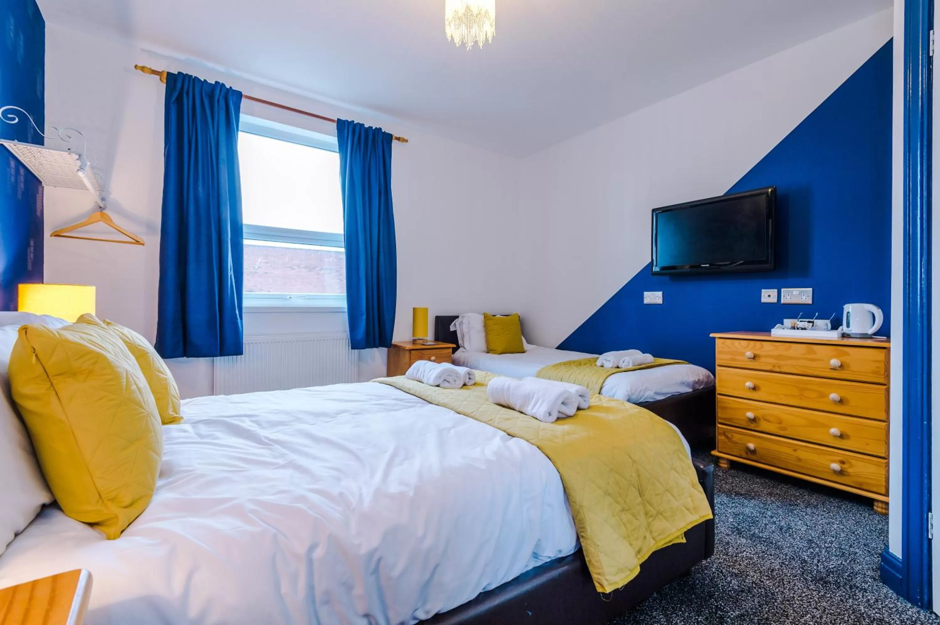 Bed in Pebbles Guest House