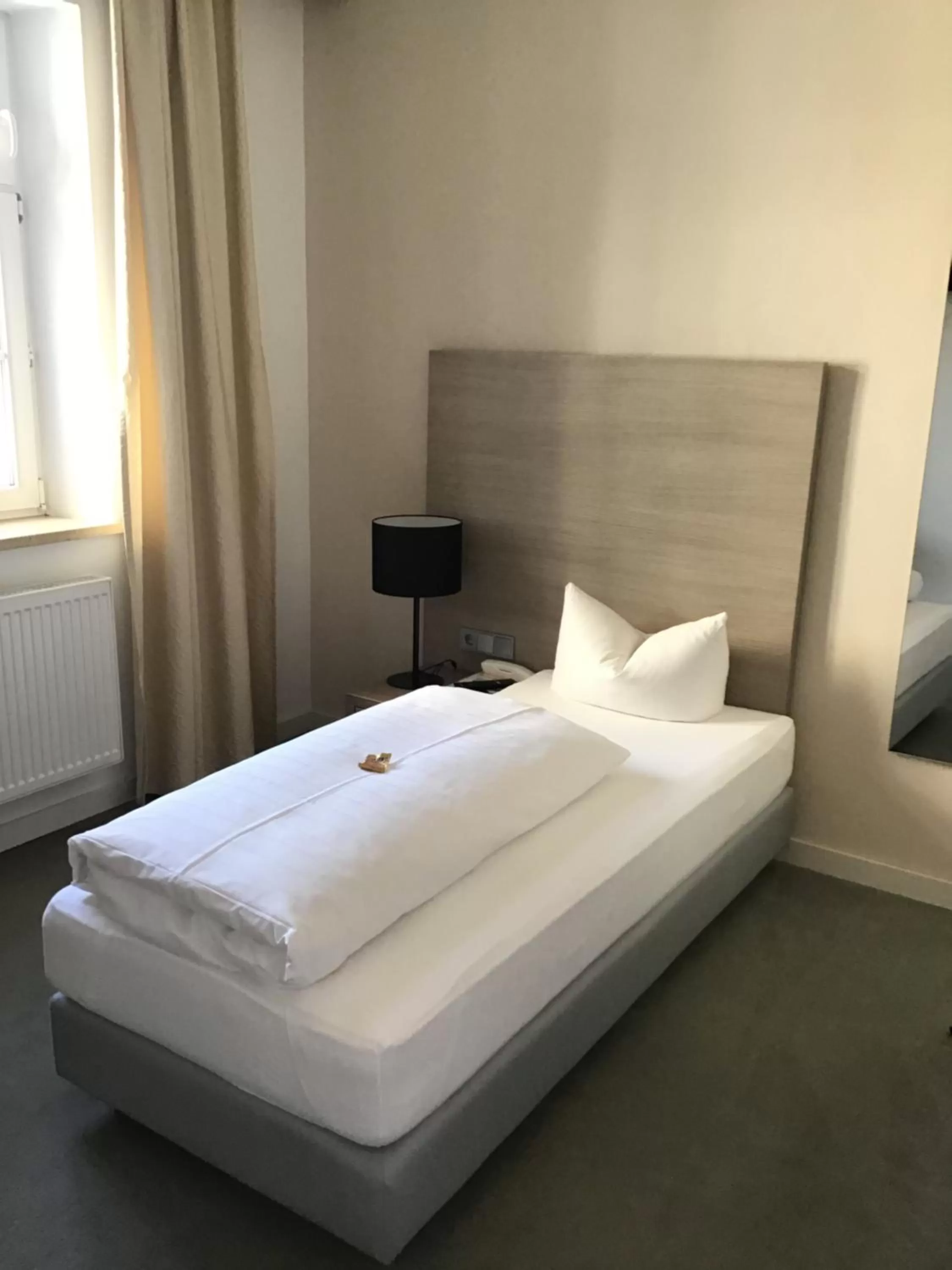 Bed in Garni Hotel Schmaus