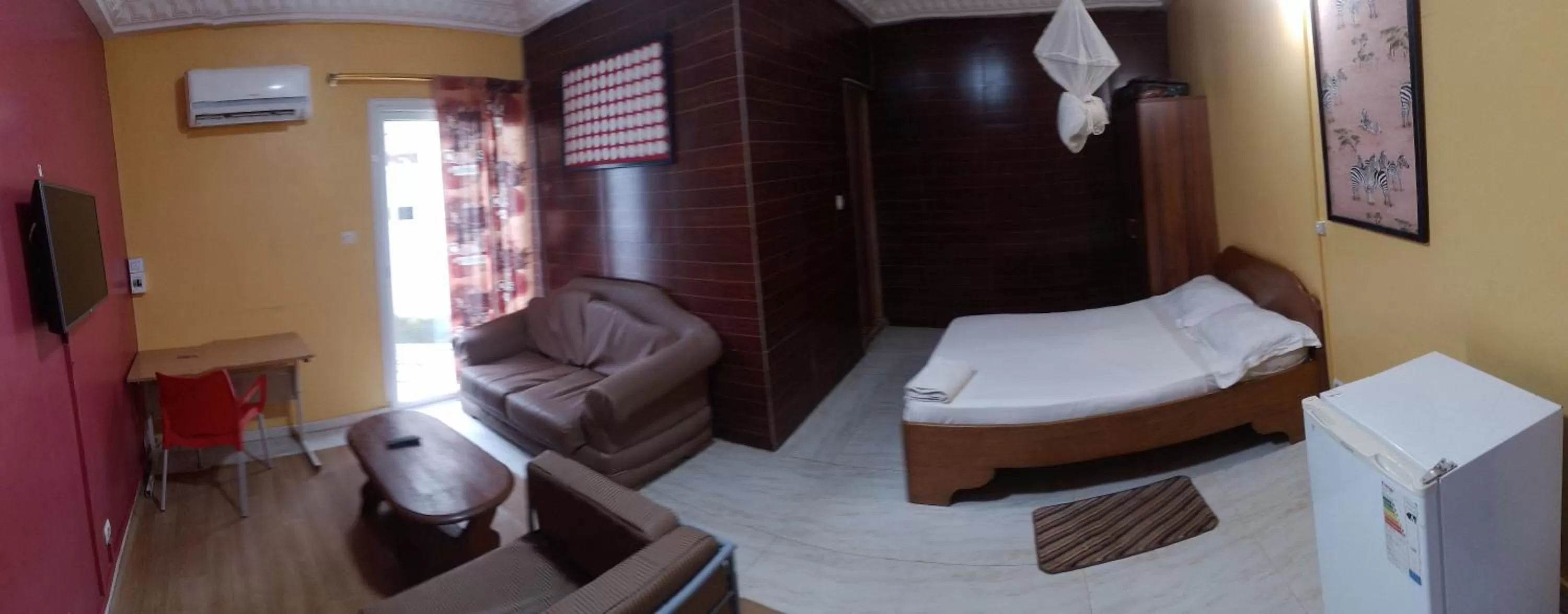 Photo of the whole room, Seating Area in Hôtel abdou diouf