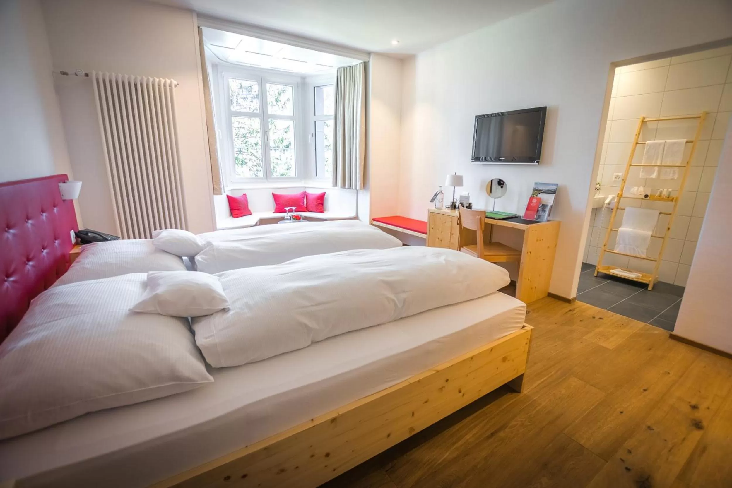 Photo of the whole room, Bed in Blatter's Arosa Hotel & Bella Vista SPA