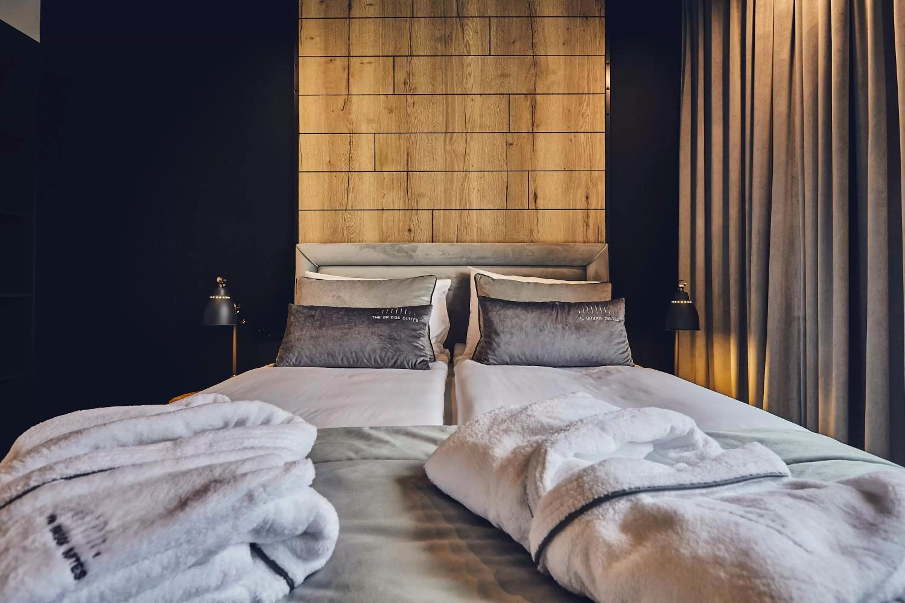 Bed in The Bridge Suites Hotel