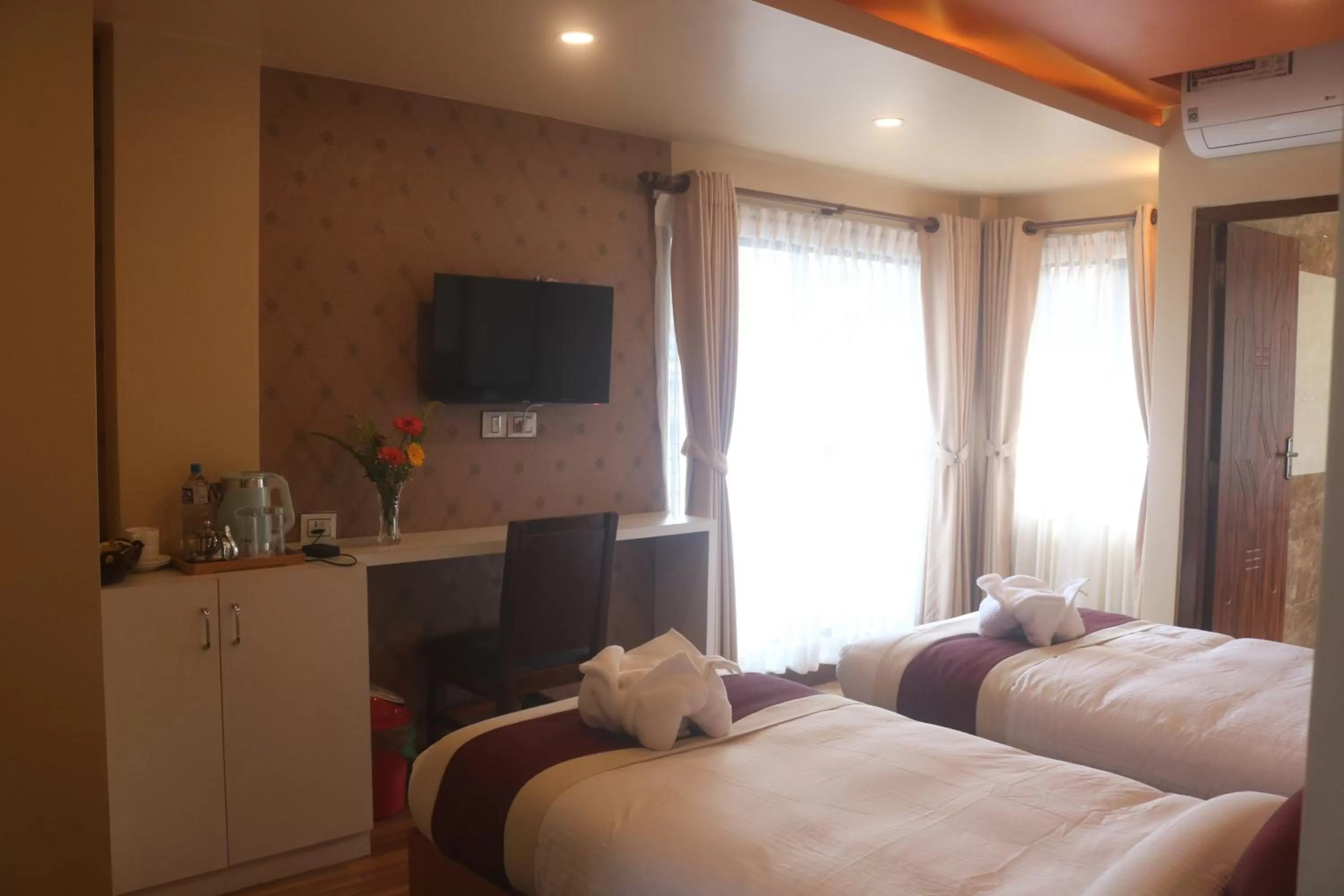 Bedroom, Bed in Hotel Family Ties Pvt. Ltd.