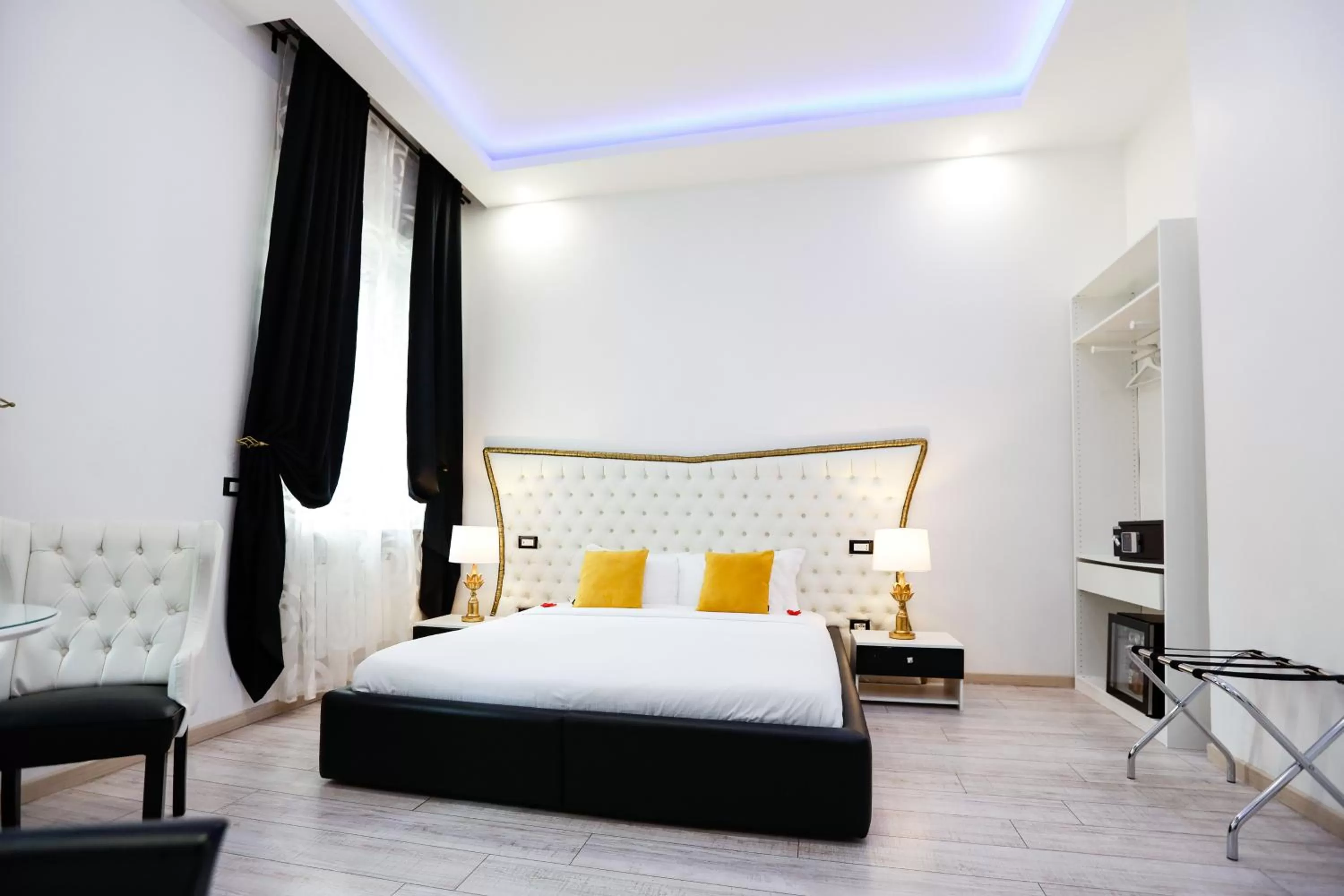 Bed in Escape Luxury Suite - CA Domus Collection