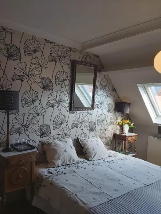 Bed in B&B De Mansarde