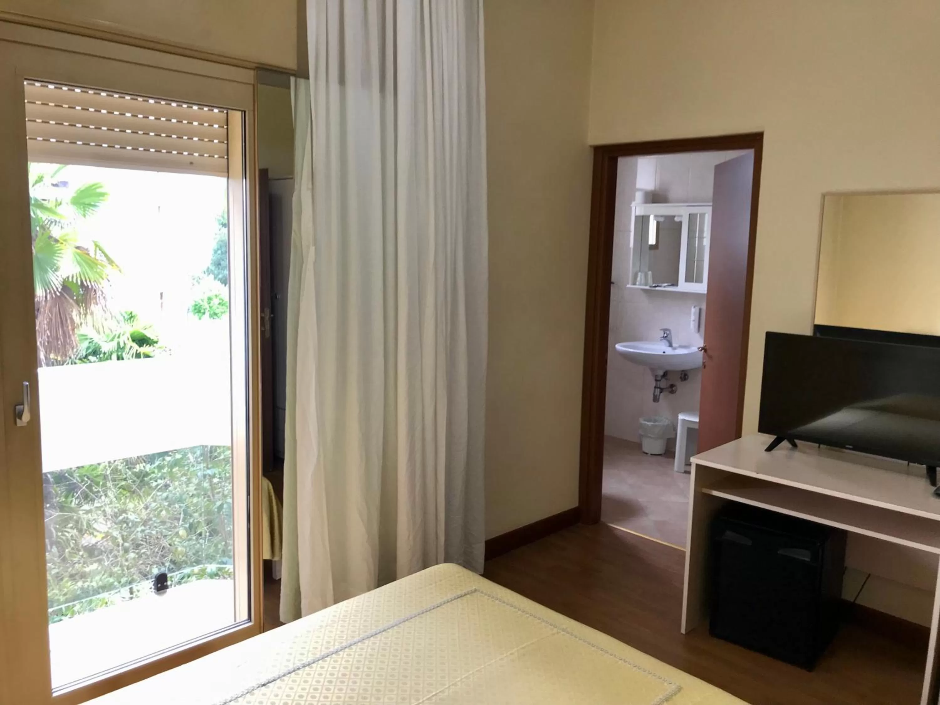 TV/Entertainment Center in Hotel B&B Risorta