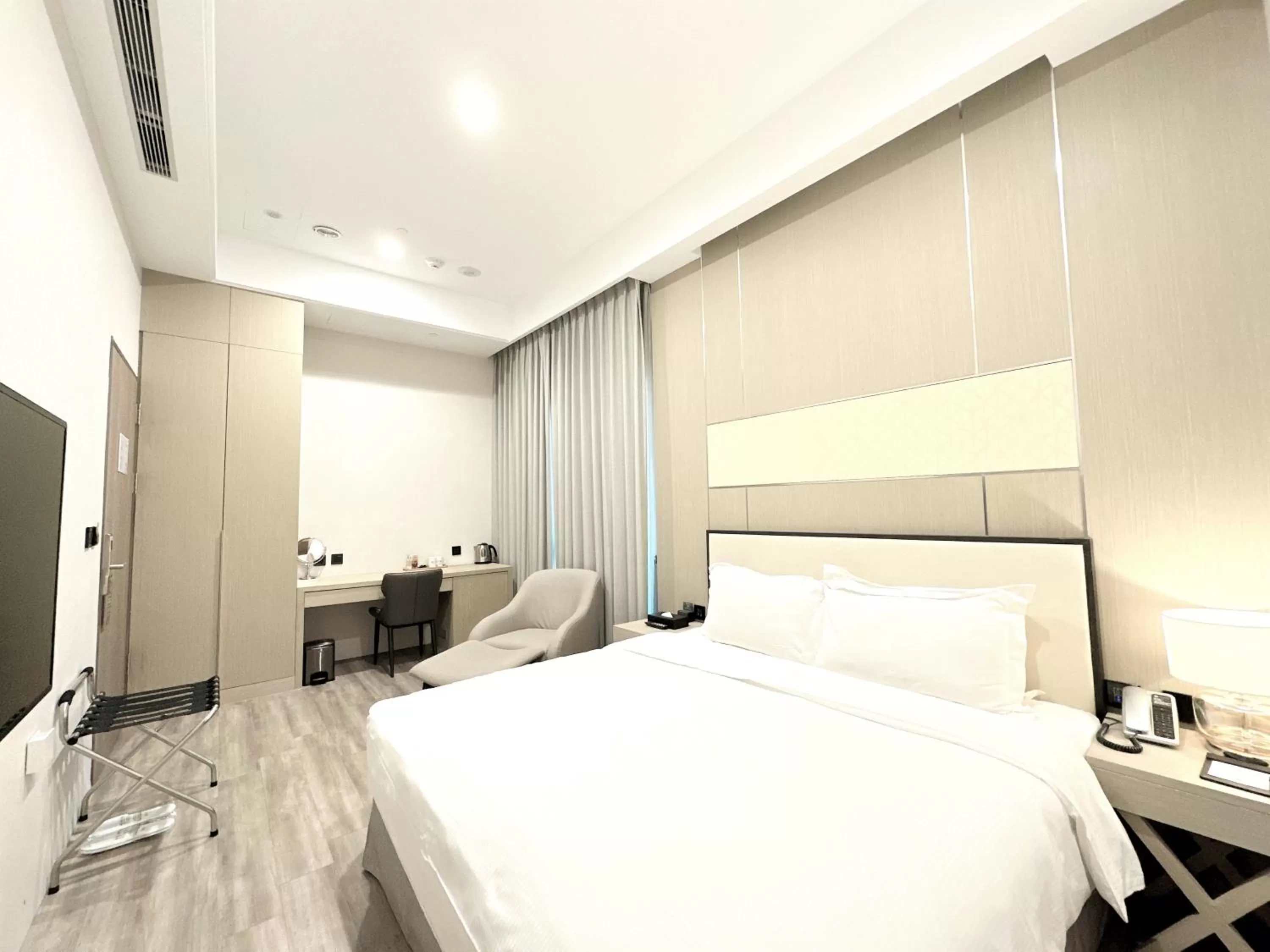 Bed in 台南星鑽國際商旅 Hua Hotel