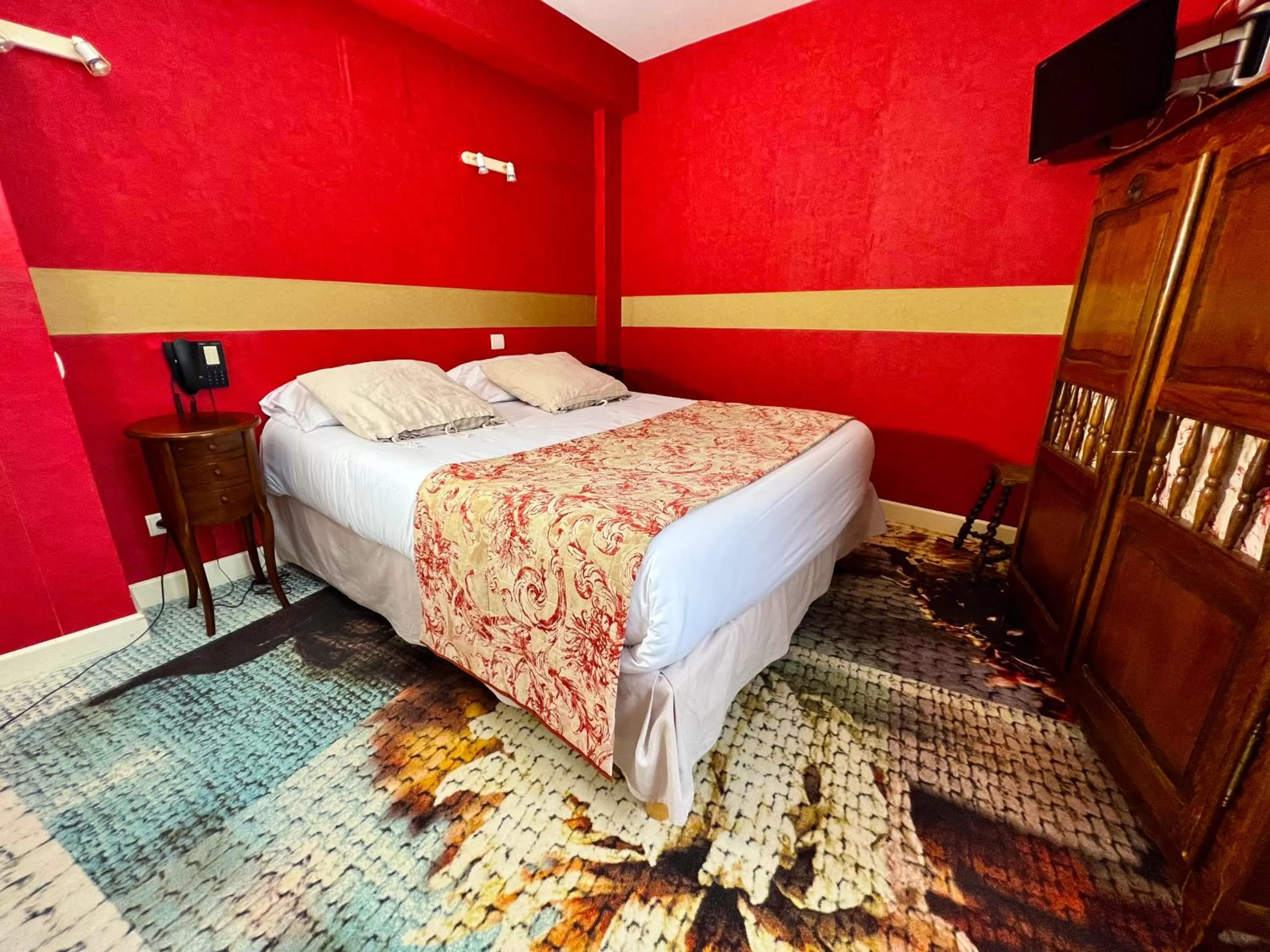 Bed in Hotel De La Poste