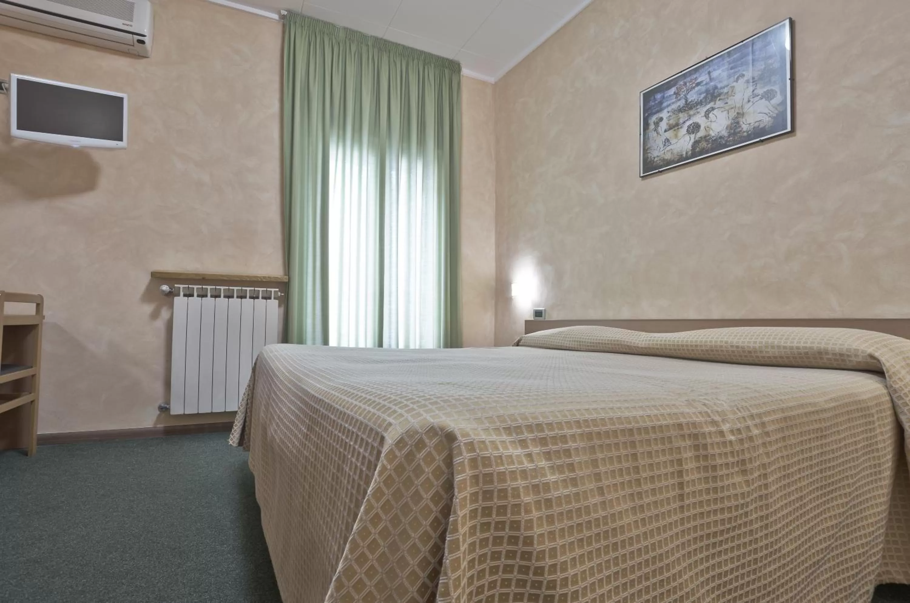 Bed in Hotel Valentini Inn