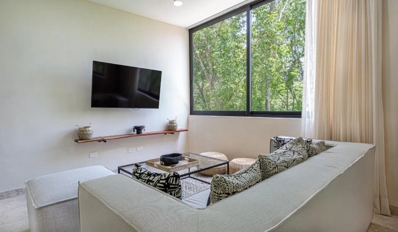 TV and multimedia, TV/Entertainment Center in Kuukum Tulum Hotel