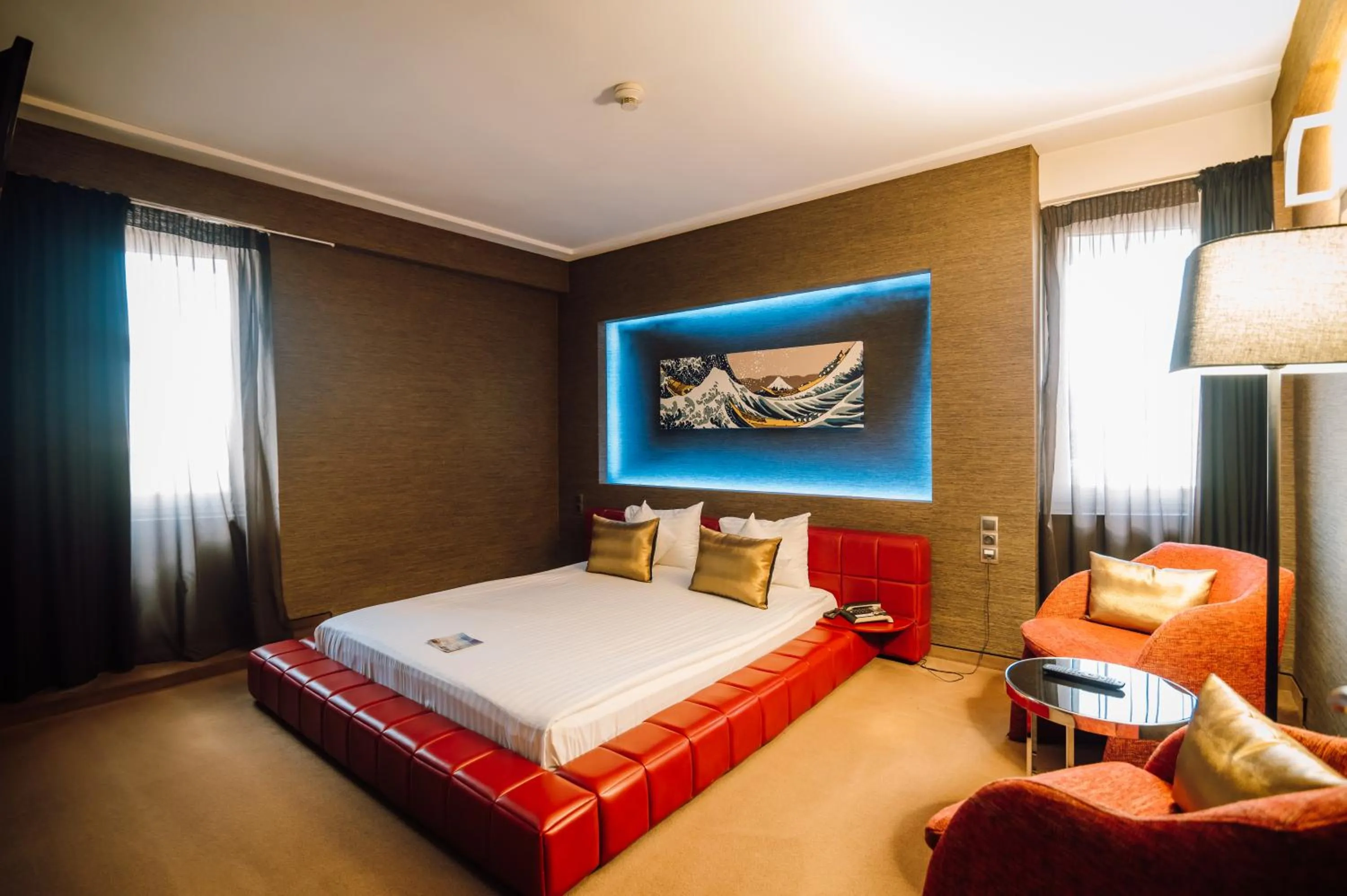 Bed in Plaza V Hotel