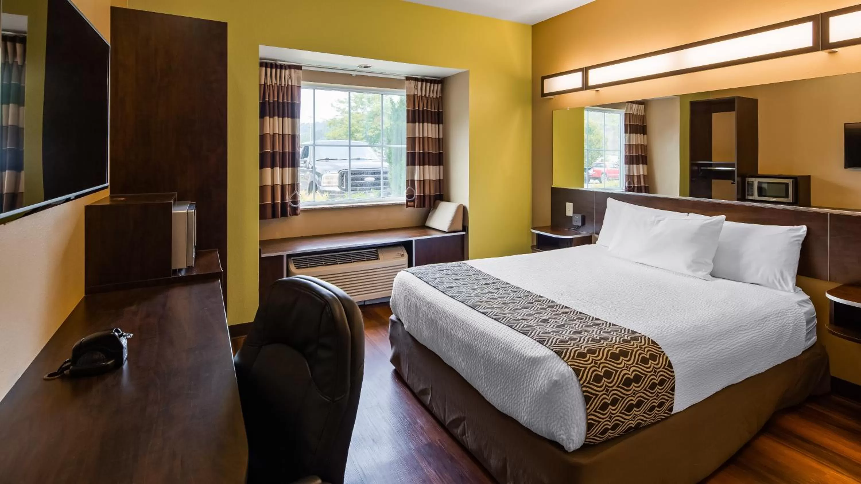 Bed in SureStay Plus Hotel by Best Western Buckhannon