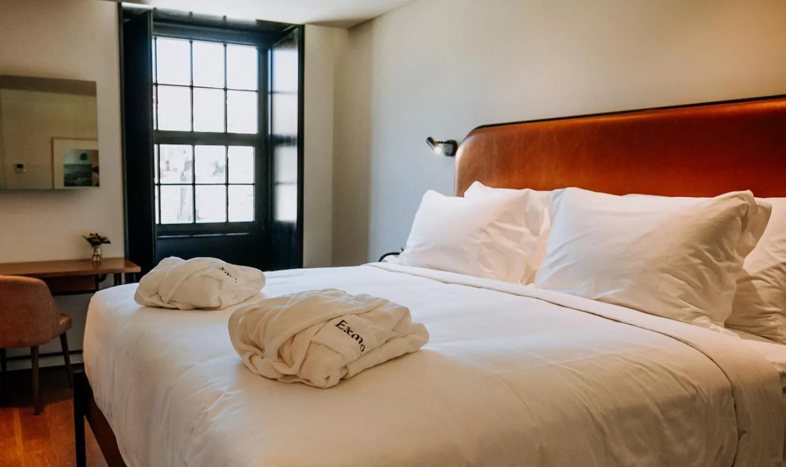 Bed in Exmo Hotel by Olivia