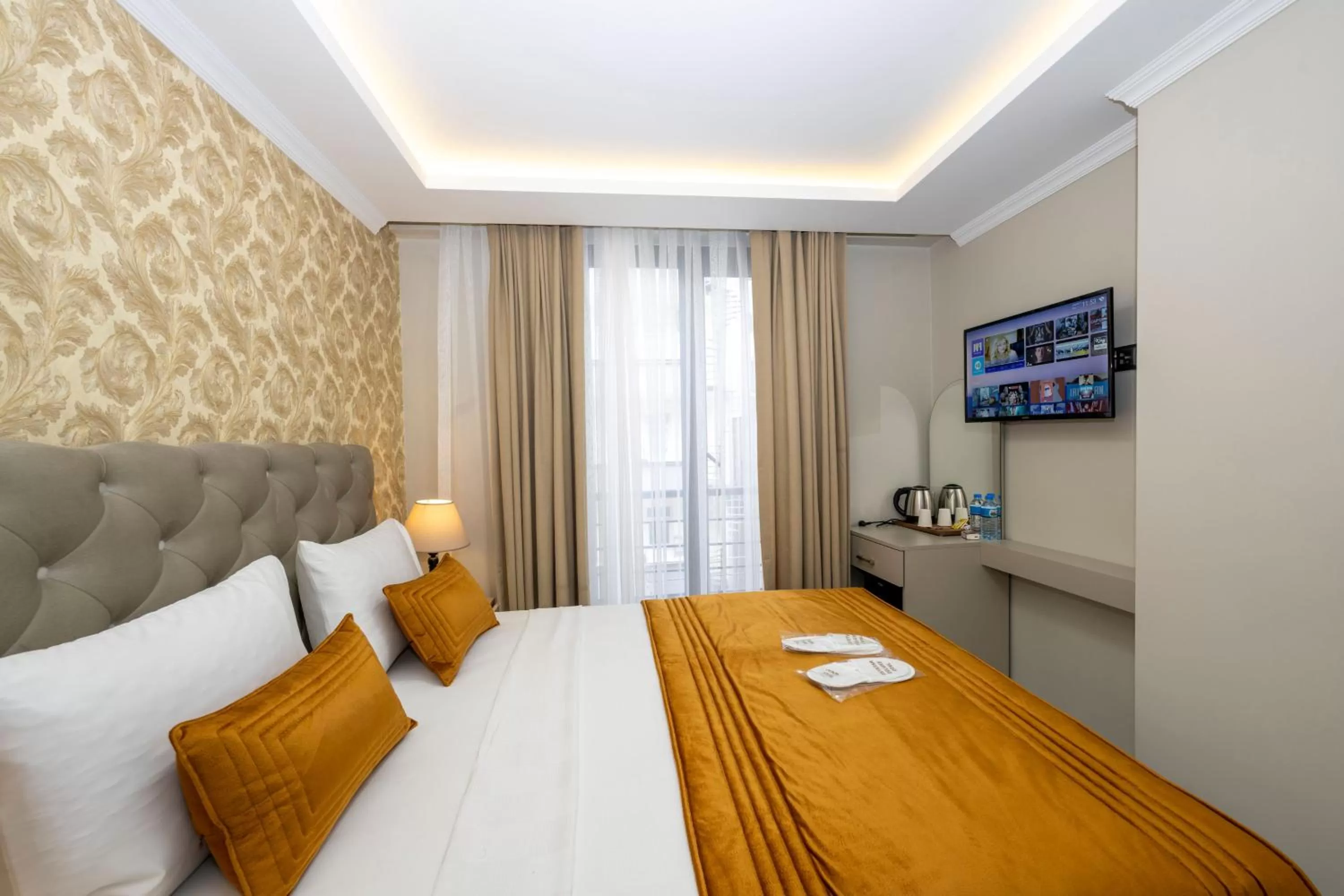 Bed in SKYSTAR DELUXE HOTEL