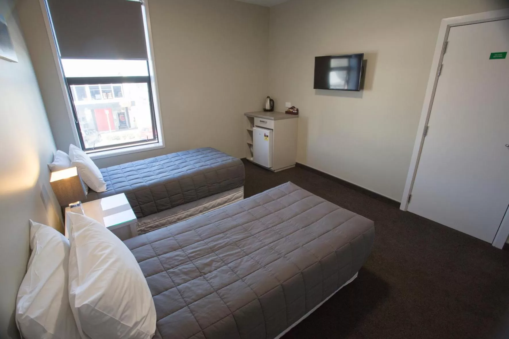 Bed in Stumpers Hotel