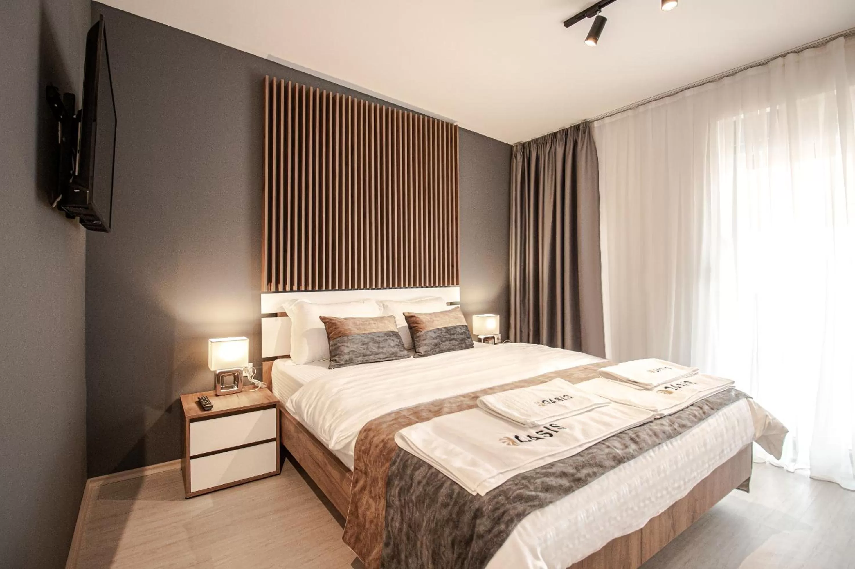 Bed in OASIS Apartments