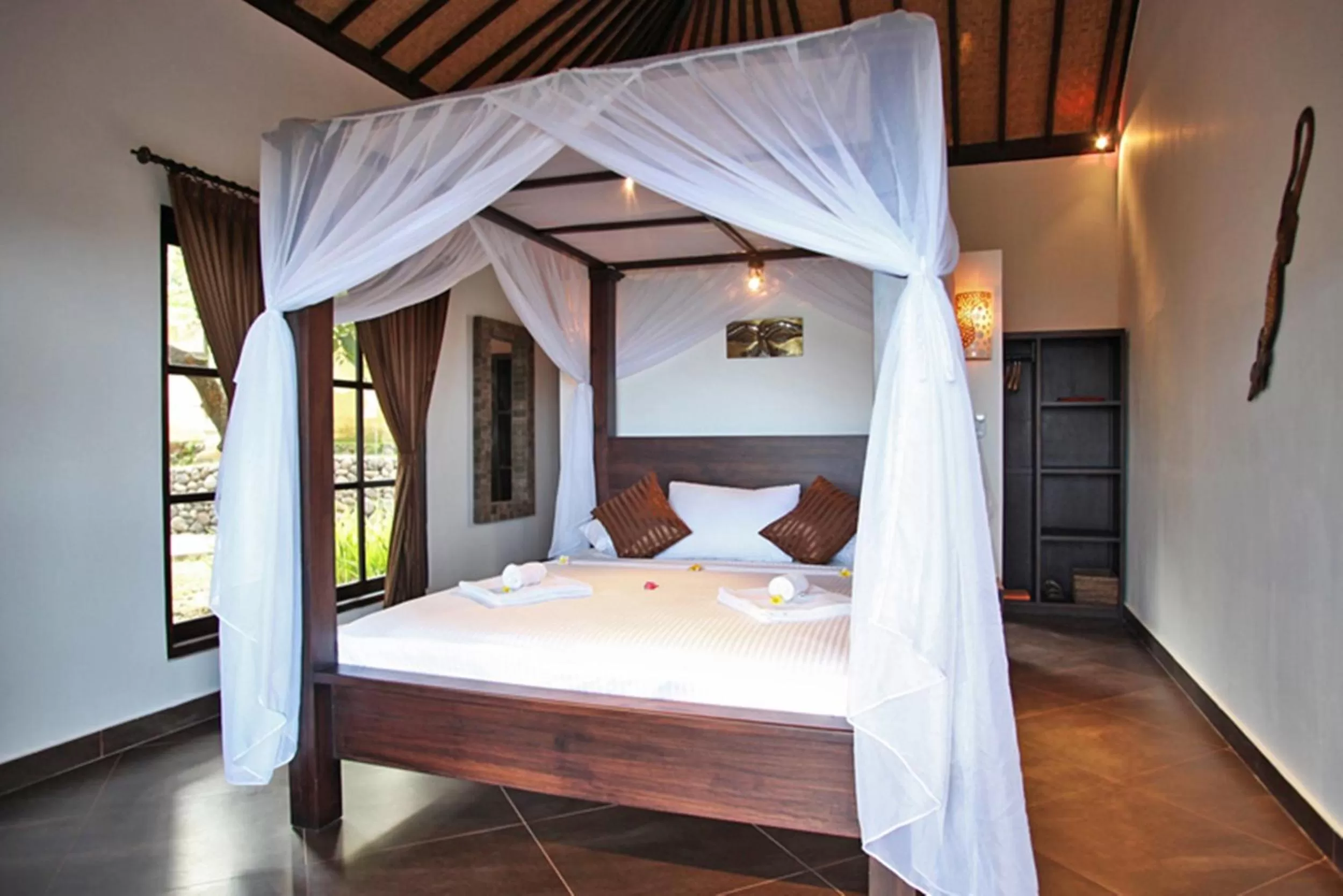 Photo of the whole room, Bed in Puri Mangga Sea View Resort and Spa