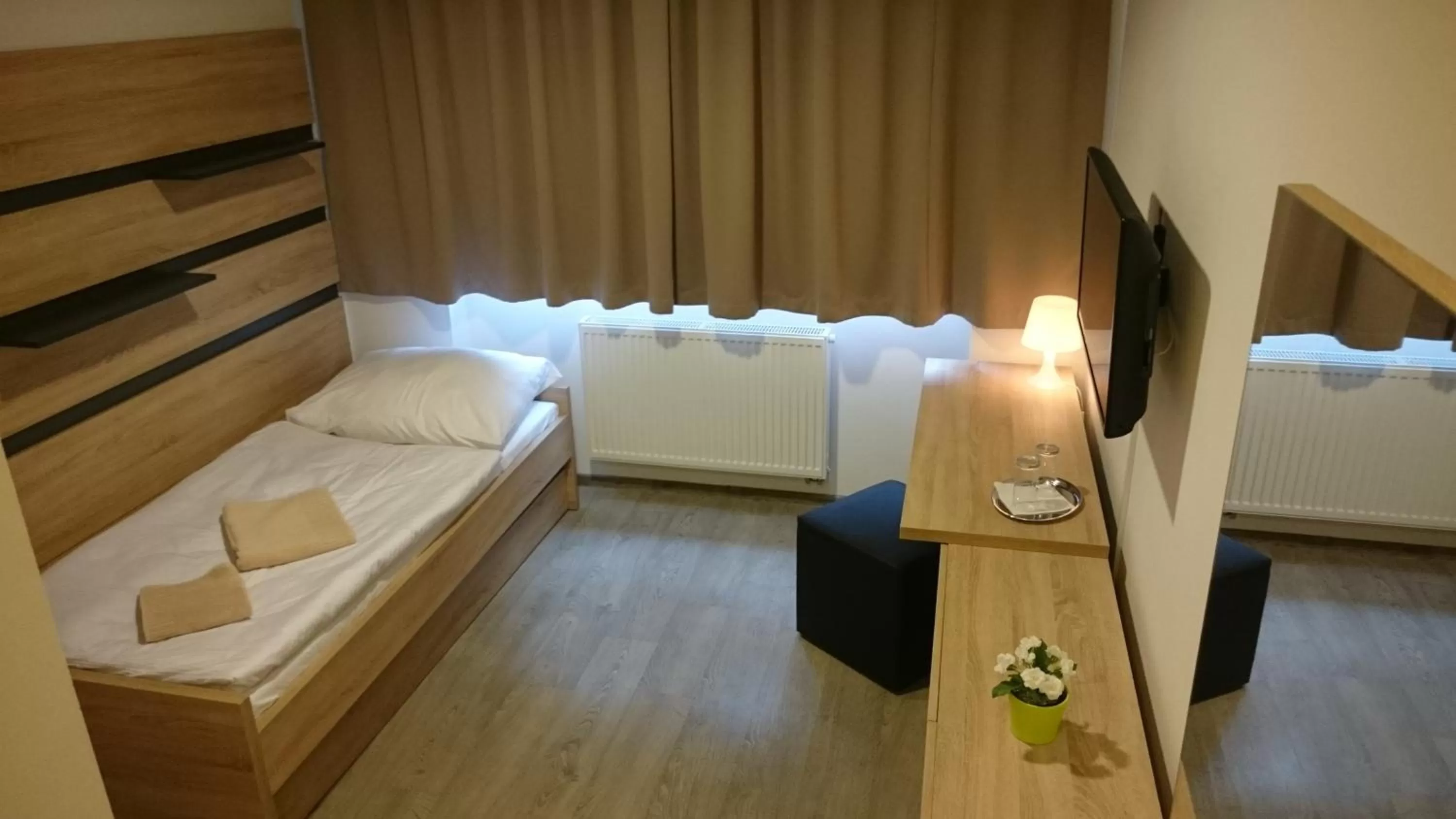 Photo of the whole room, Bed in TaM Autohof Malacky