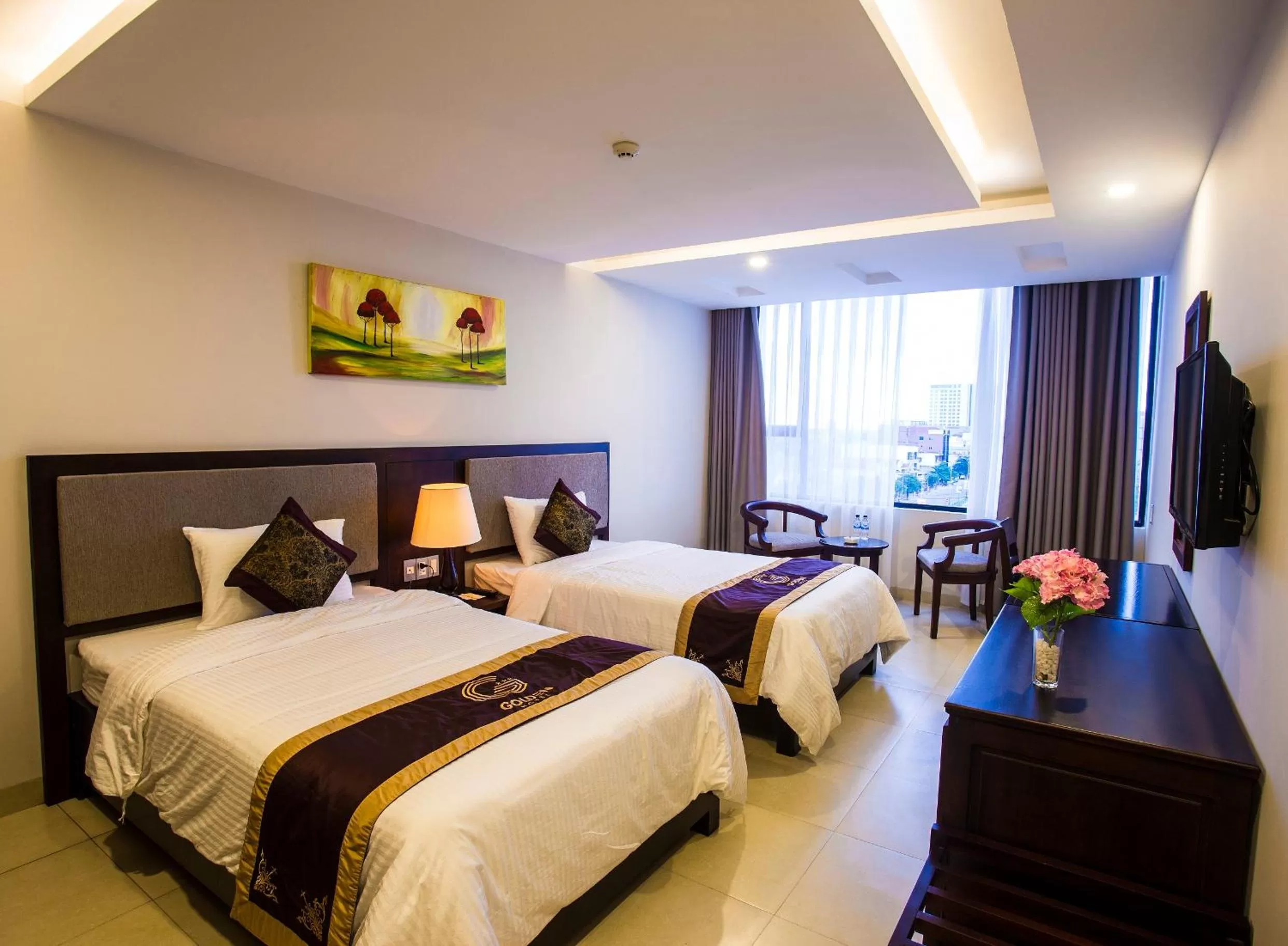 Bed in Golden Quang Tri Hotel