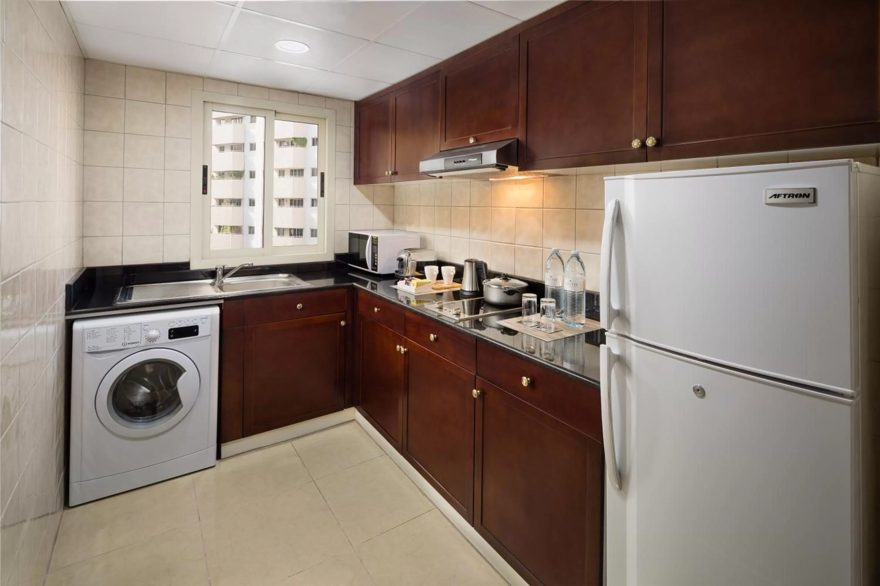 Kitchen or kitchenette in Savoy Crest Hotel Apartments