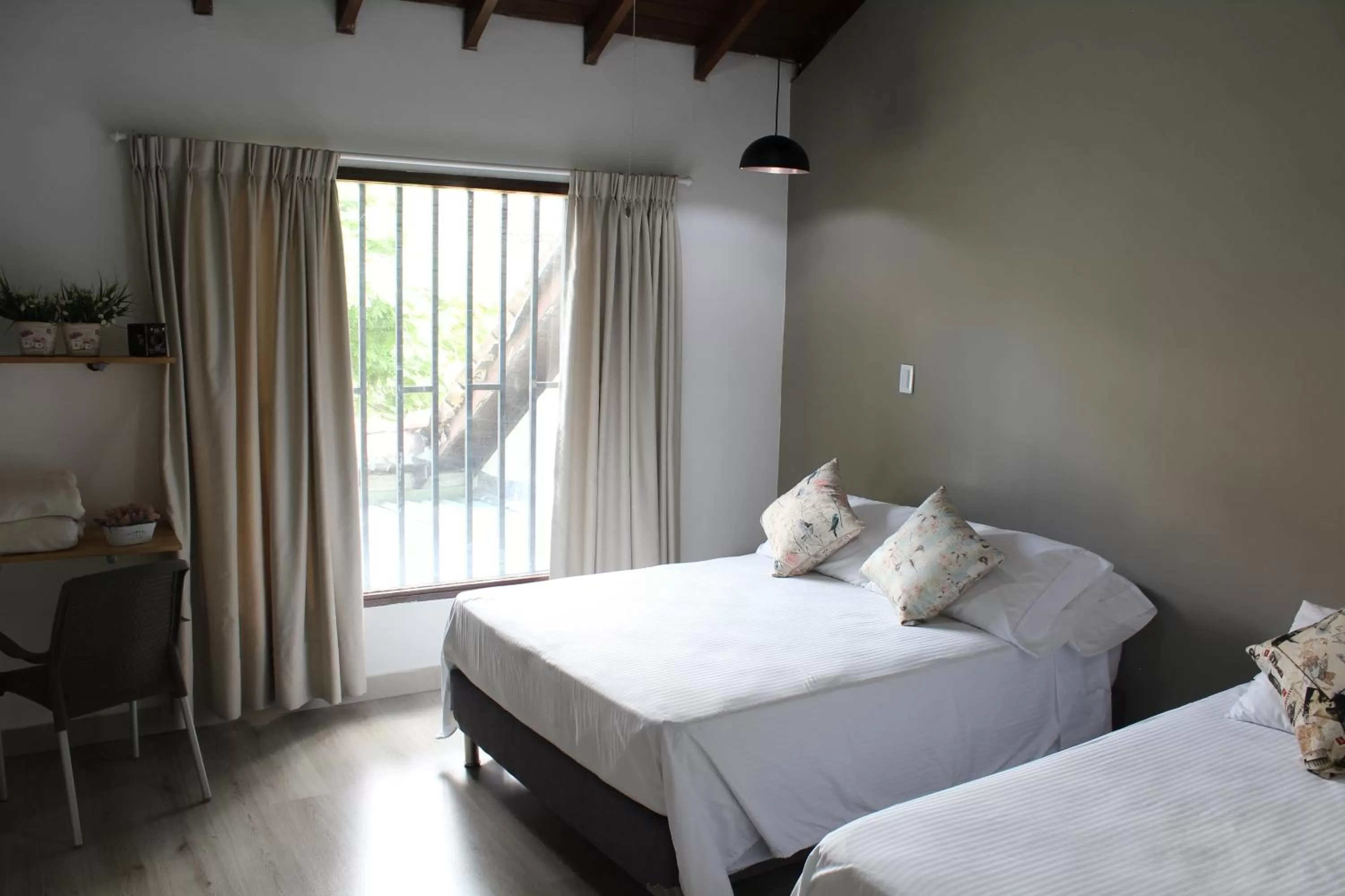 Bed in Hotel Boutique Plaza