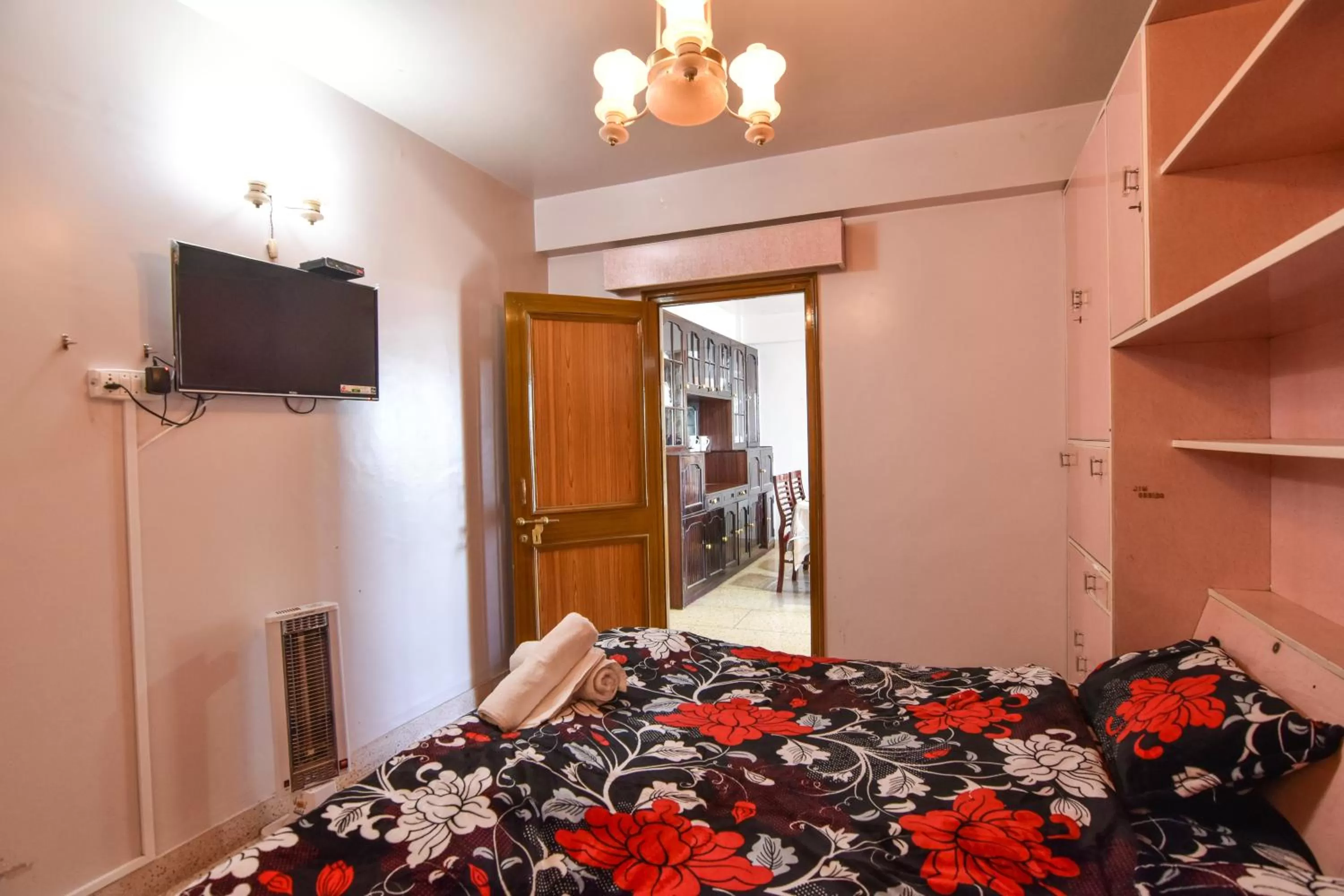 Bedroom, Bed in Dhanlaxmi Apartments