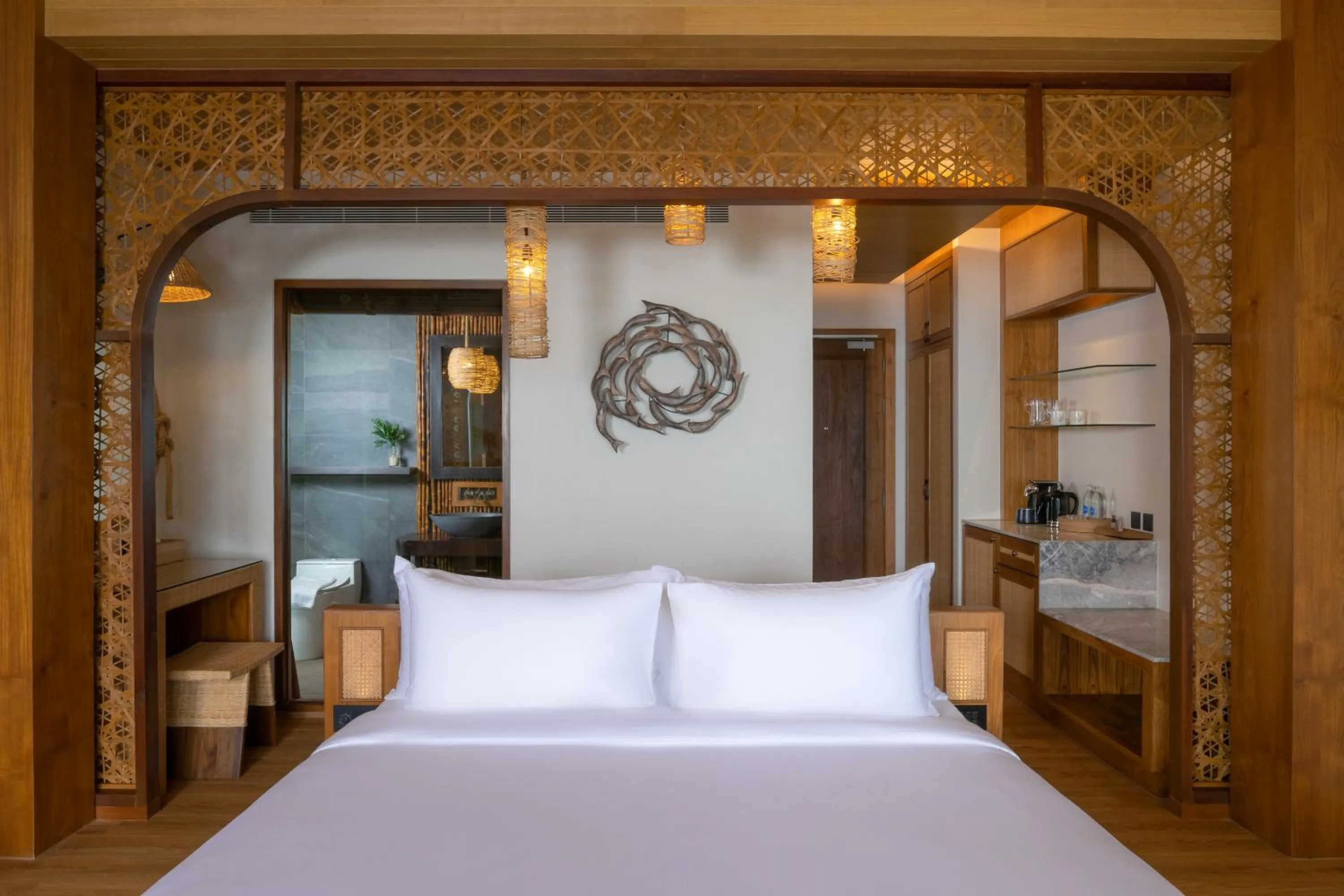 Bed in SINAE Phuket Luxury Hotel