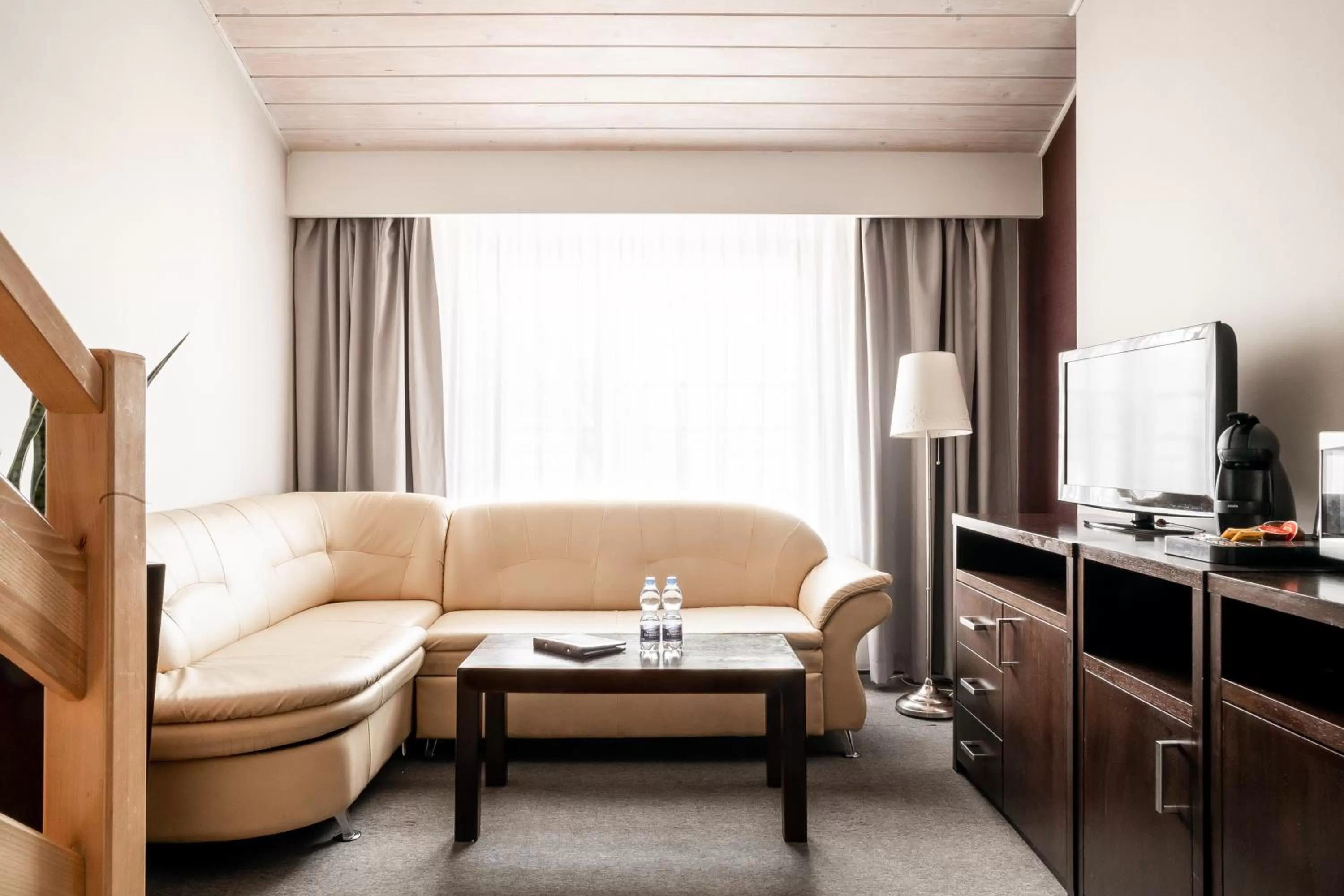 Seating area in Rezydencja Sienkiewiczówka