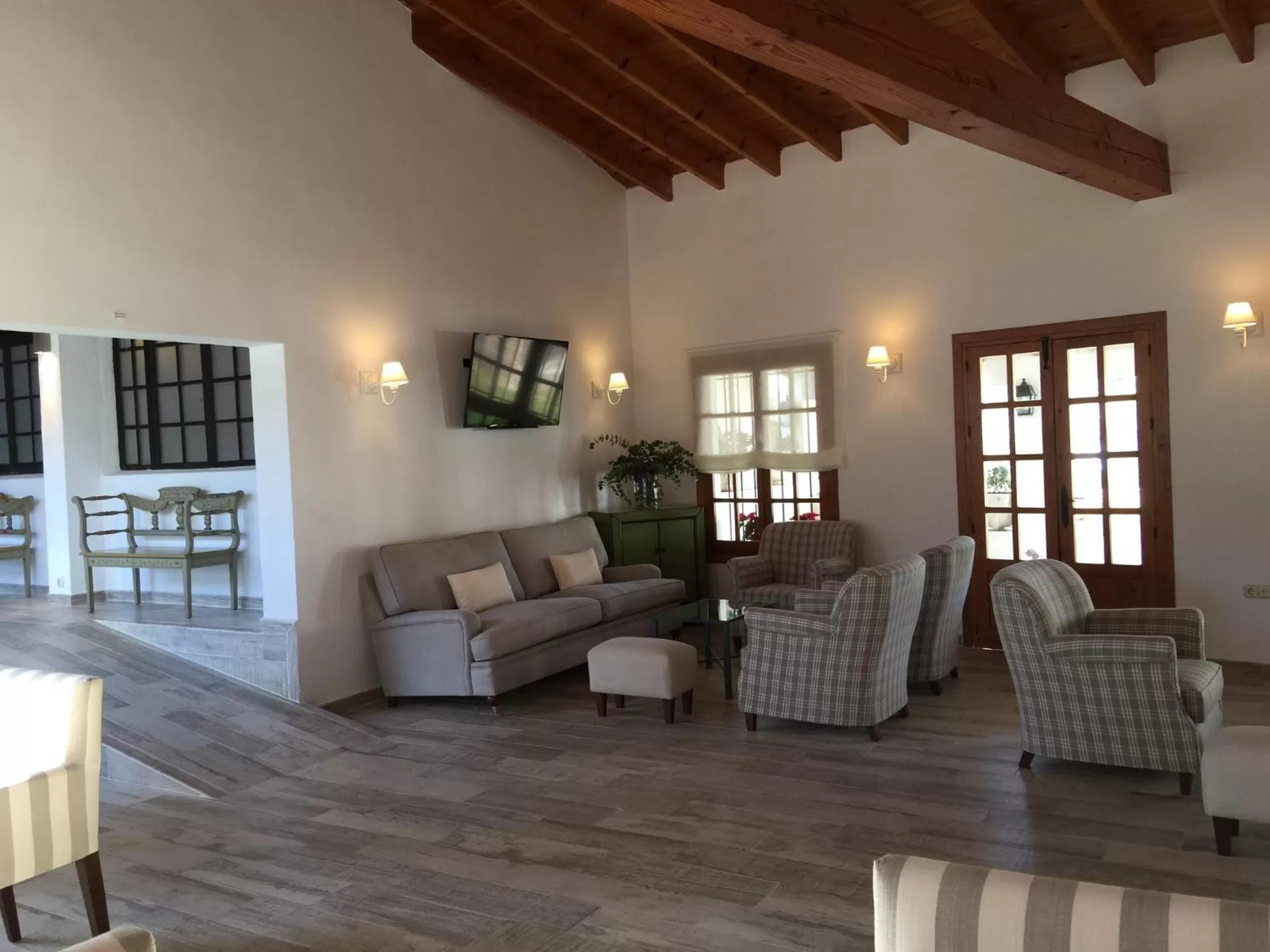 Communal lounge/ TV room, Seating Area in Alhaurin Golf Hotel