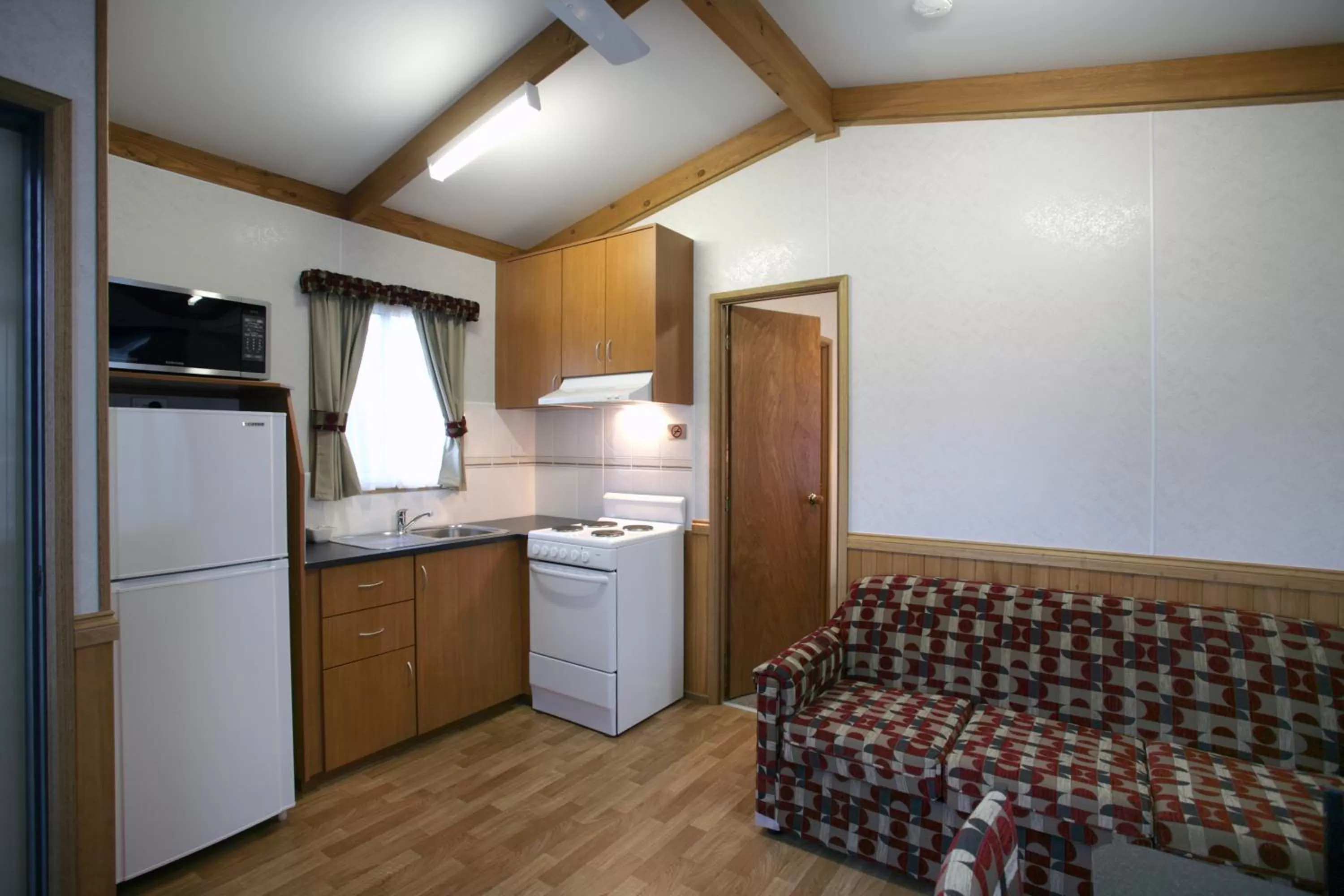 Living room in Alivio Tourist Park Canberra