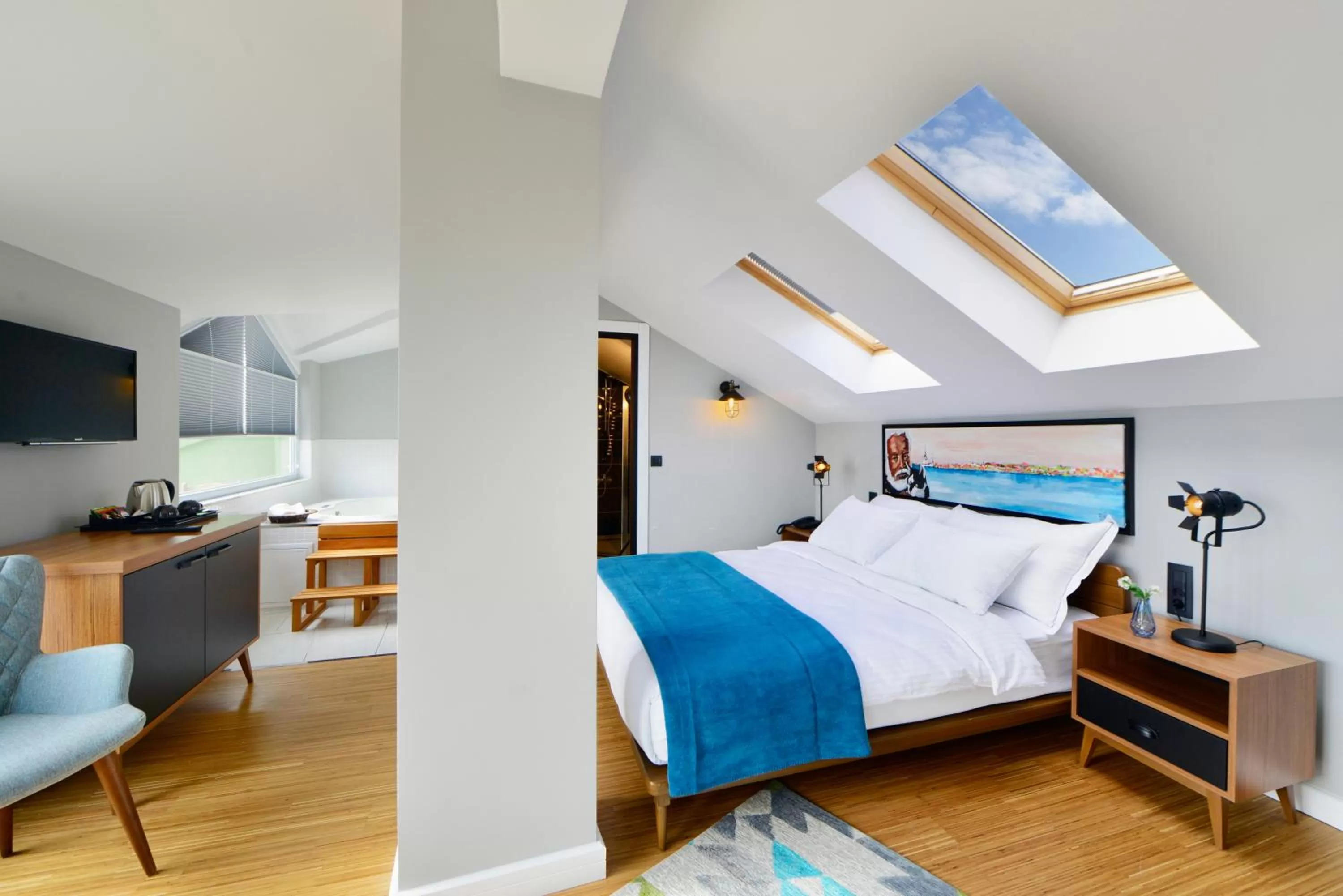 Photo of the whole room, Bed in Hotel Poem