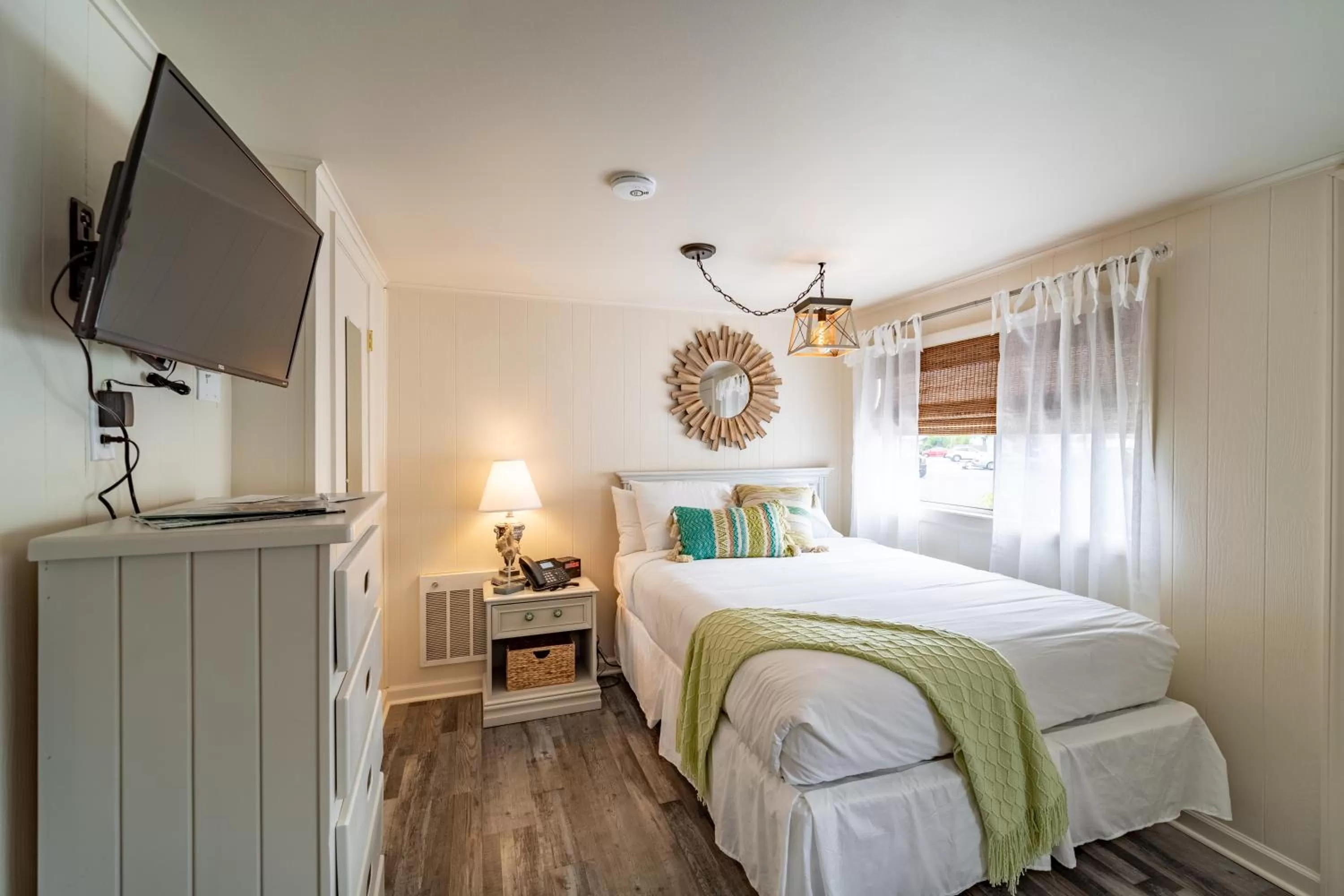 Bed in Ocean Glass Inn