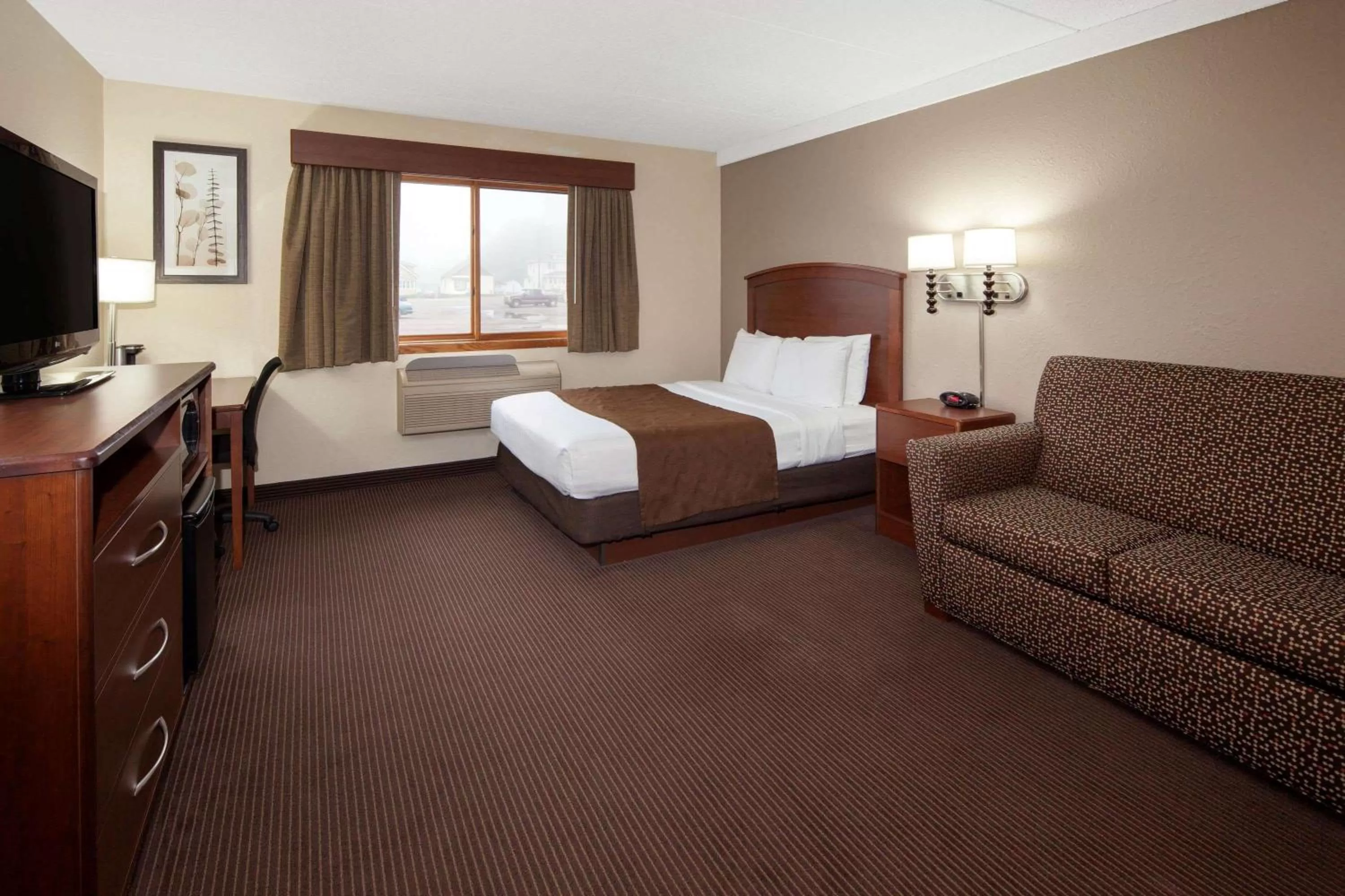 Photo of the whole room, Bed in AmericInn by Wyndham Ironwood