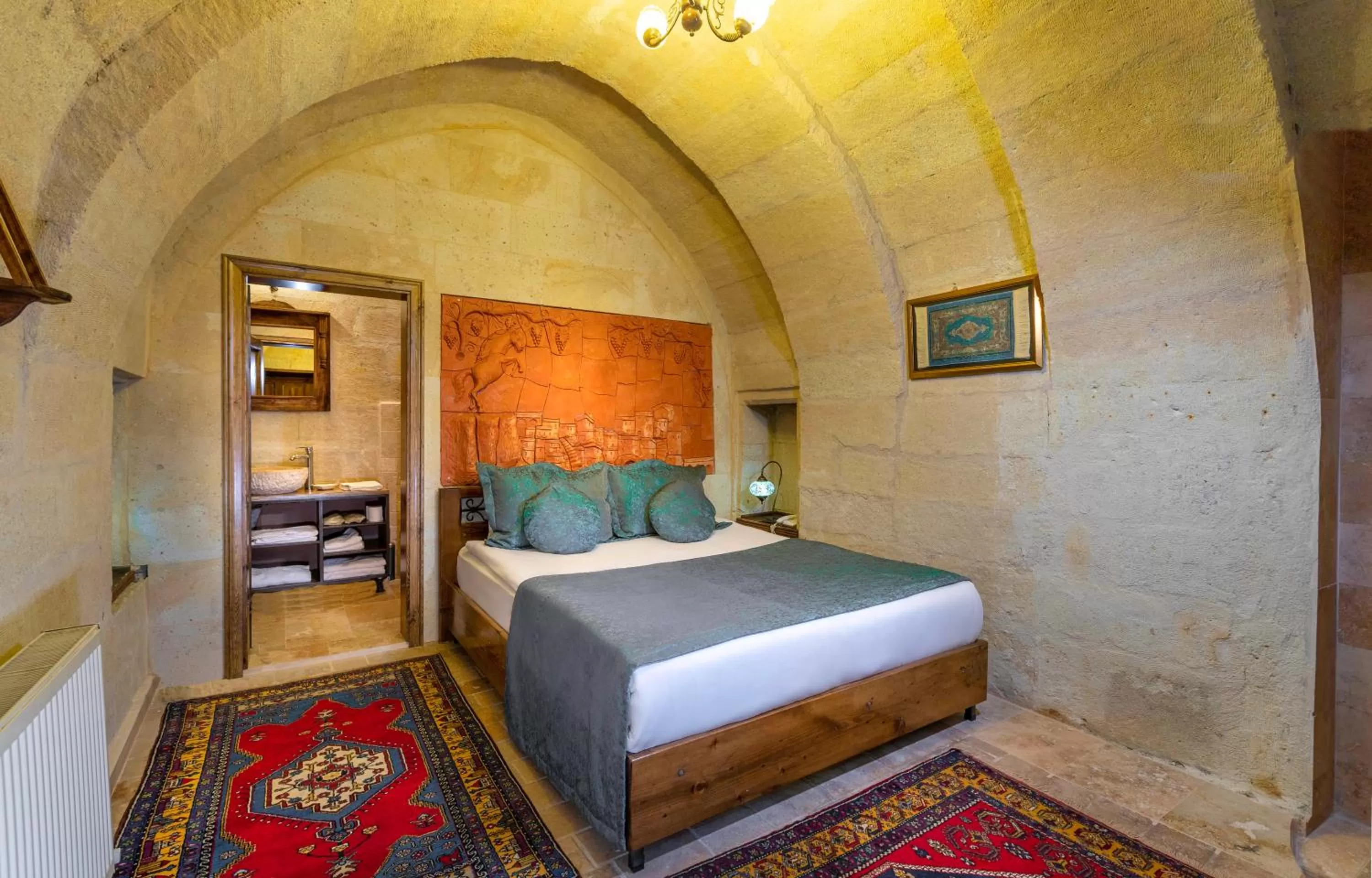 Bed in Adora Cave Suites -