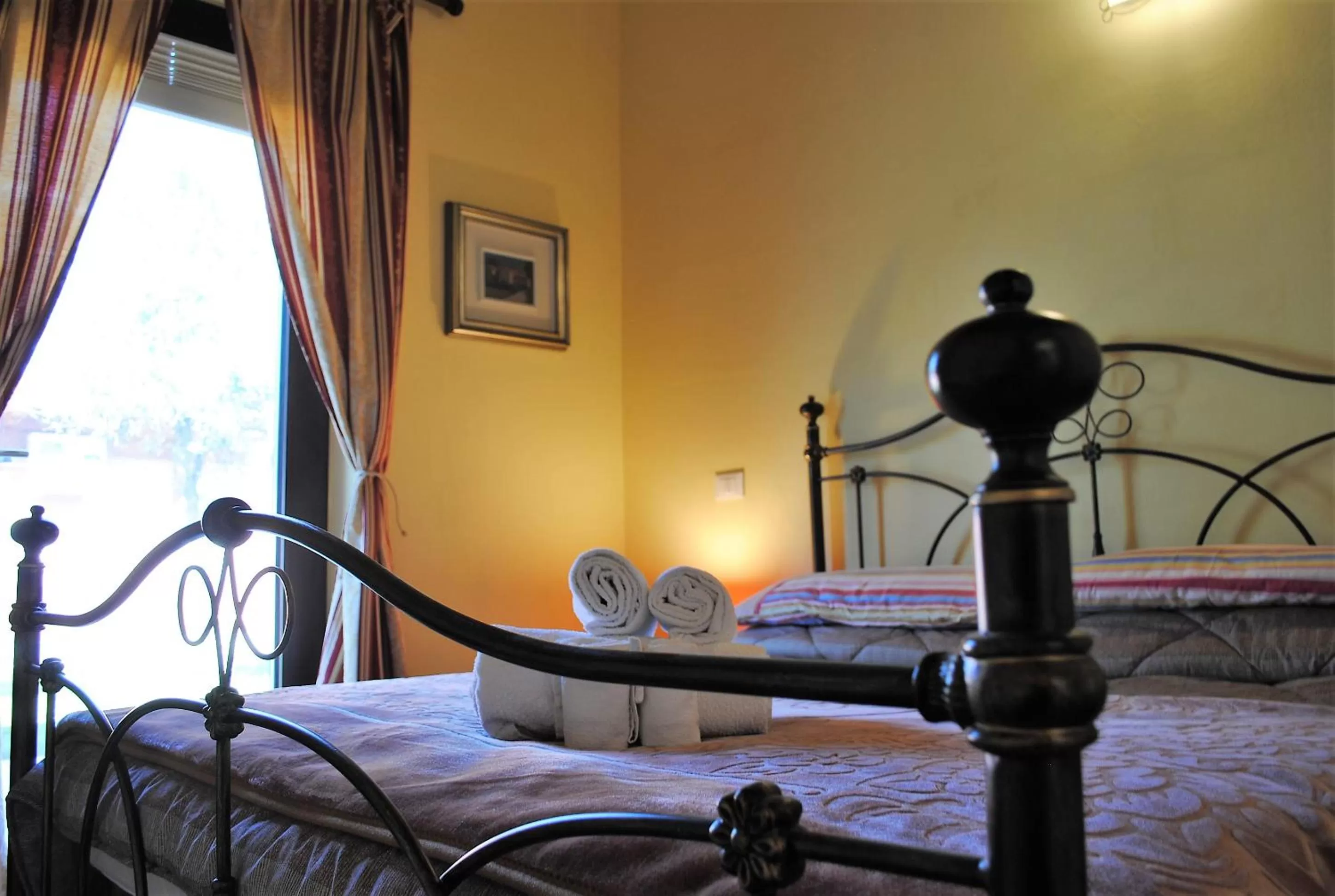 Photo of the whole room, Bed in AGRITURISMO MELOGRANO D'ORO