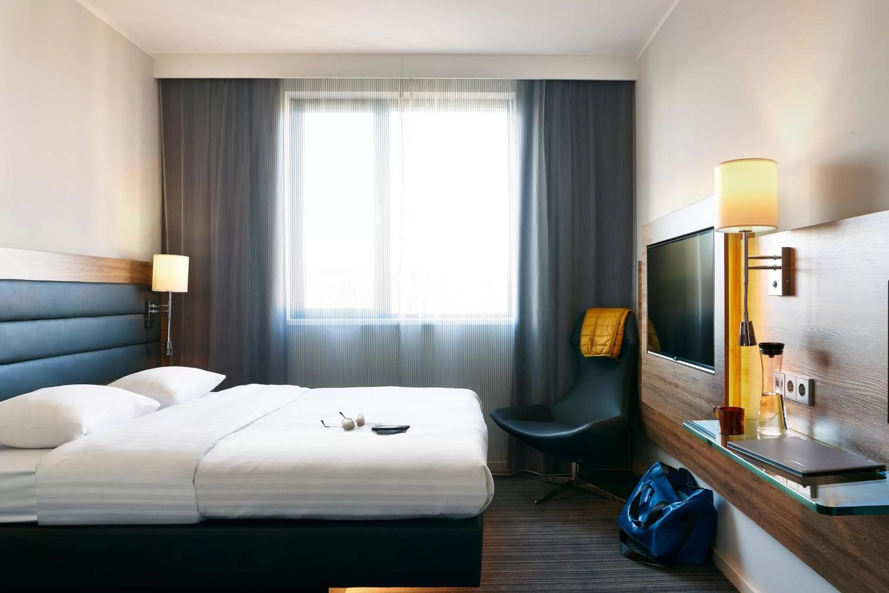 Photo of the whole room, Bed in Moxy Berlin Ostbahnhof
