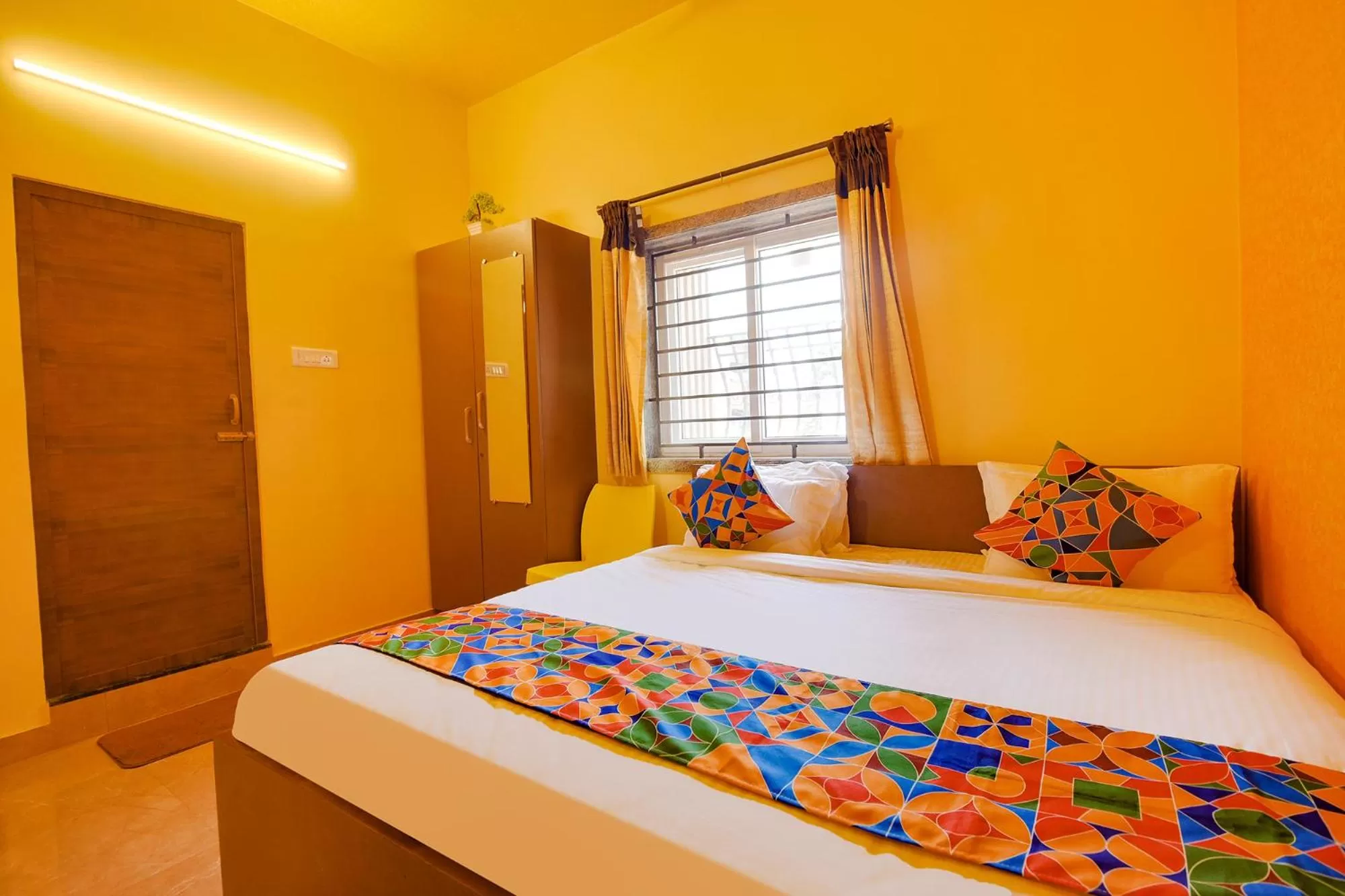 Bed in FabHotel Vijaylakshmi Stay Inn