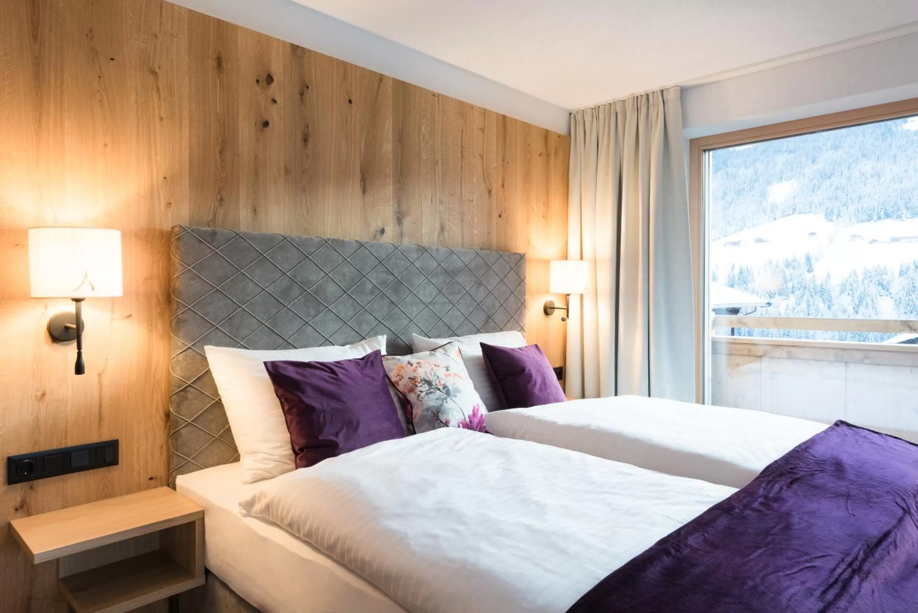 Bed in Boutiquehotel die Alpbacherin 4 Sterne Superior